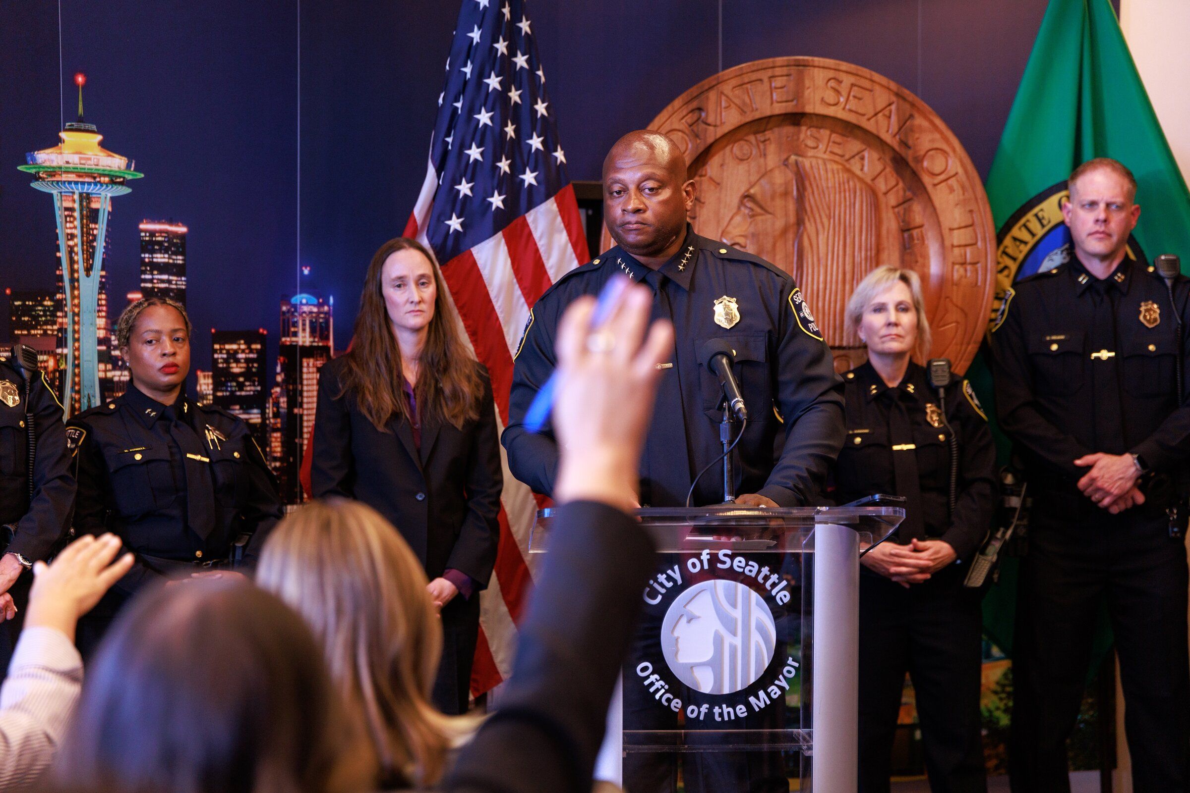 Endre Searles, acting police chief of Seattle, answers questions from journalists at City Hall on Friday. (Erika Schultz / The Seattle Times)