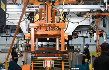 Automakers and workers face existential fight over robots, future