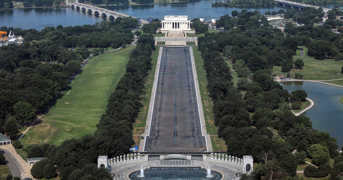 Drained Reflecting Pool reveals Trump’s ‘American flag blue’ liner is now closer to gray