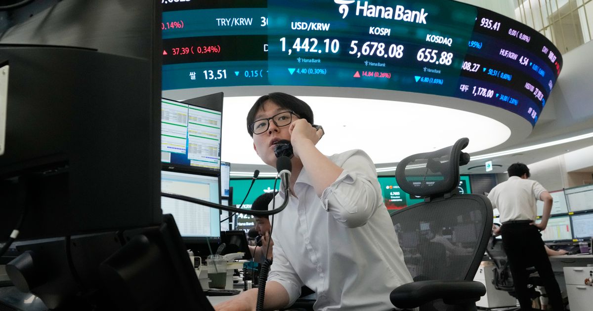 Oil prices slip and Asian shares are mostly lower as investors sell chipmaker stocks