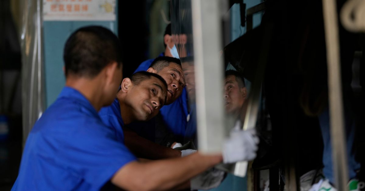 China’s factory activity unexpectedly slips into contraction in July