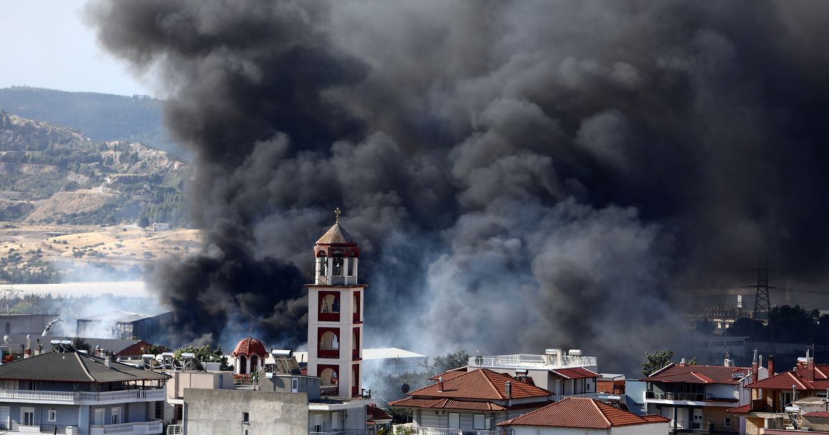 Hundreds of firefighters battle a wildfire in Portugal, while Greek authorities warn of toxic smoke