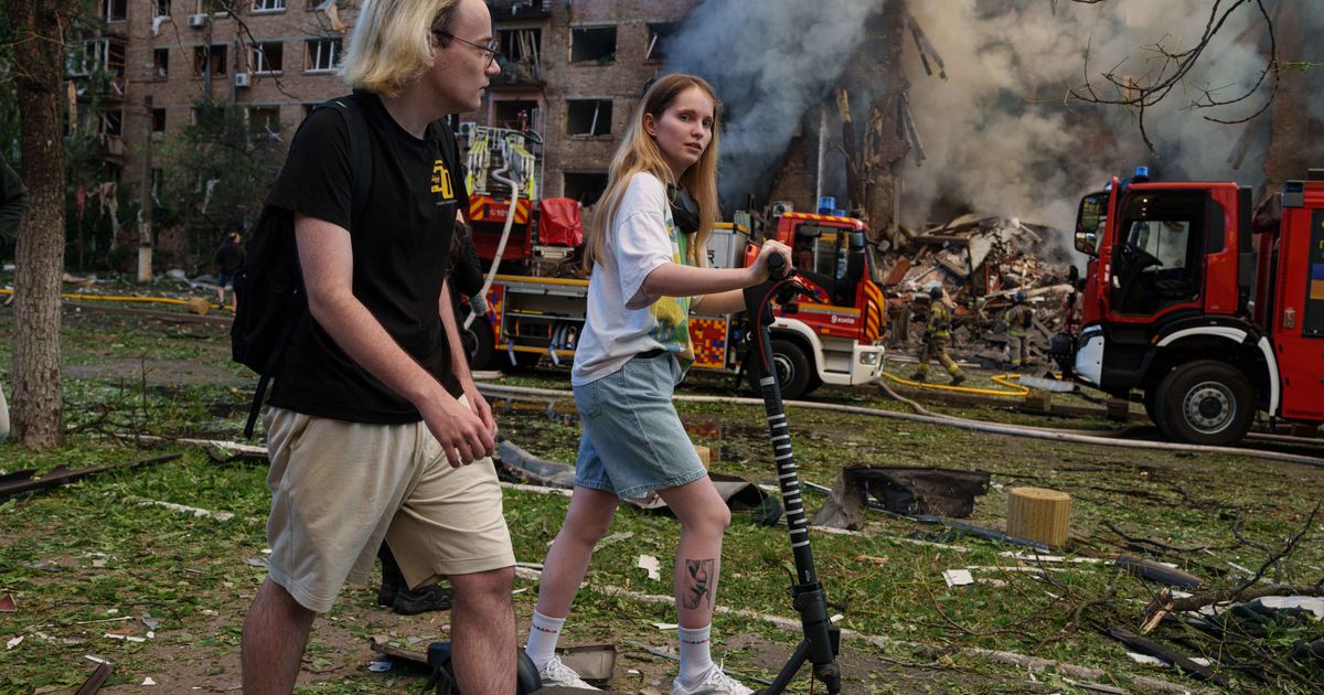 In one of Kyiv’s most frequently bombed neighborhoods, residents choose to stay