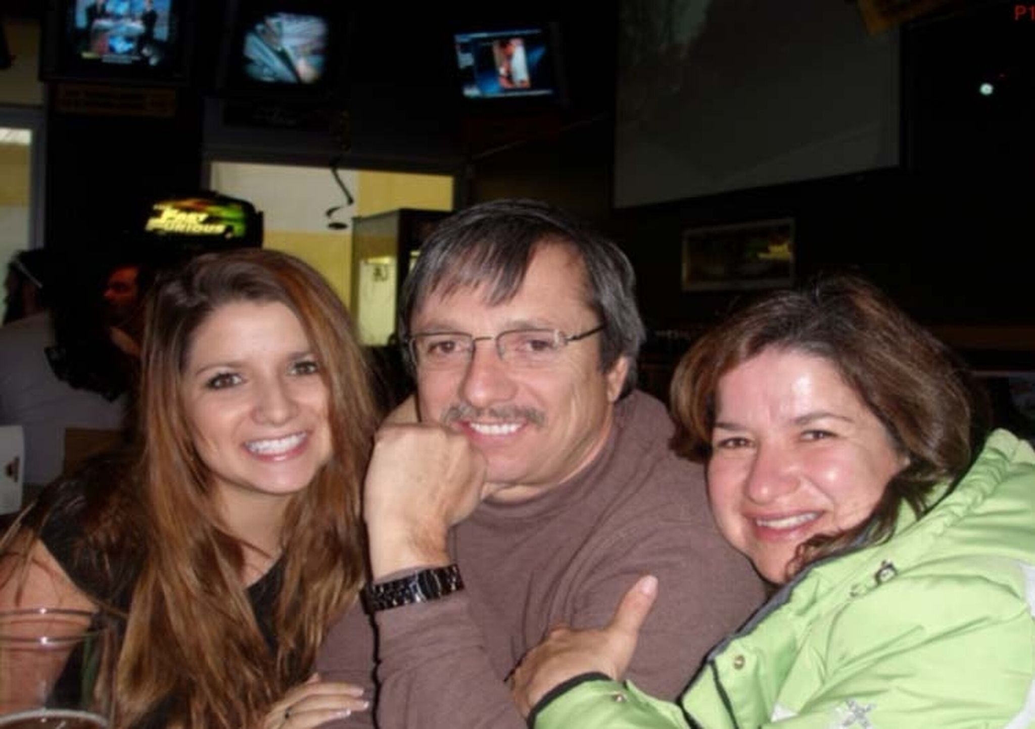 Mike Trujillo (center) suffered from amyotrophic lateral sclerosis (ALS) and sought help at the Seattle Stem Cell Center. He died in 2019, the day after a procedure there. He is survived by his wife Carmen Trujillo (right) and five children, including Sarah Trujillo-Fueger (left). (Photo provided by Swanson Gardner Meyers Cohon PLLC)