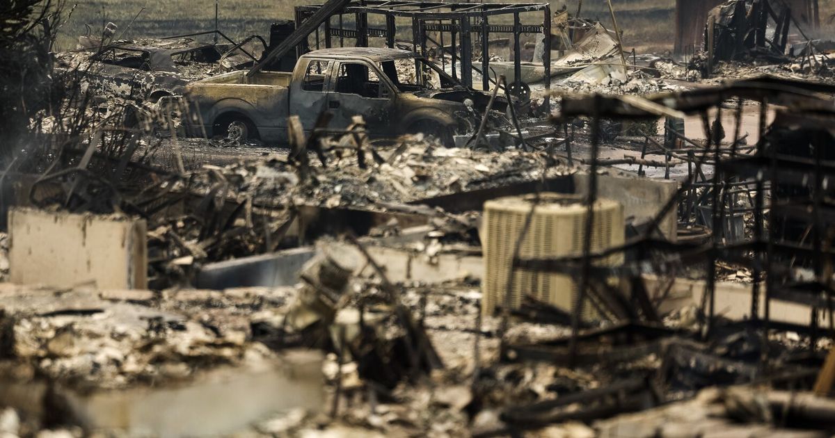 Photos: Wildfires tear through Spokane, 700 structures burned