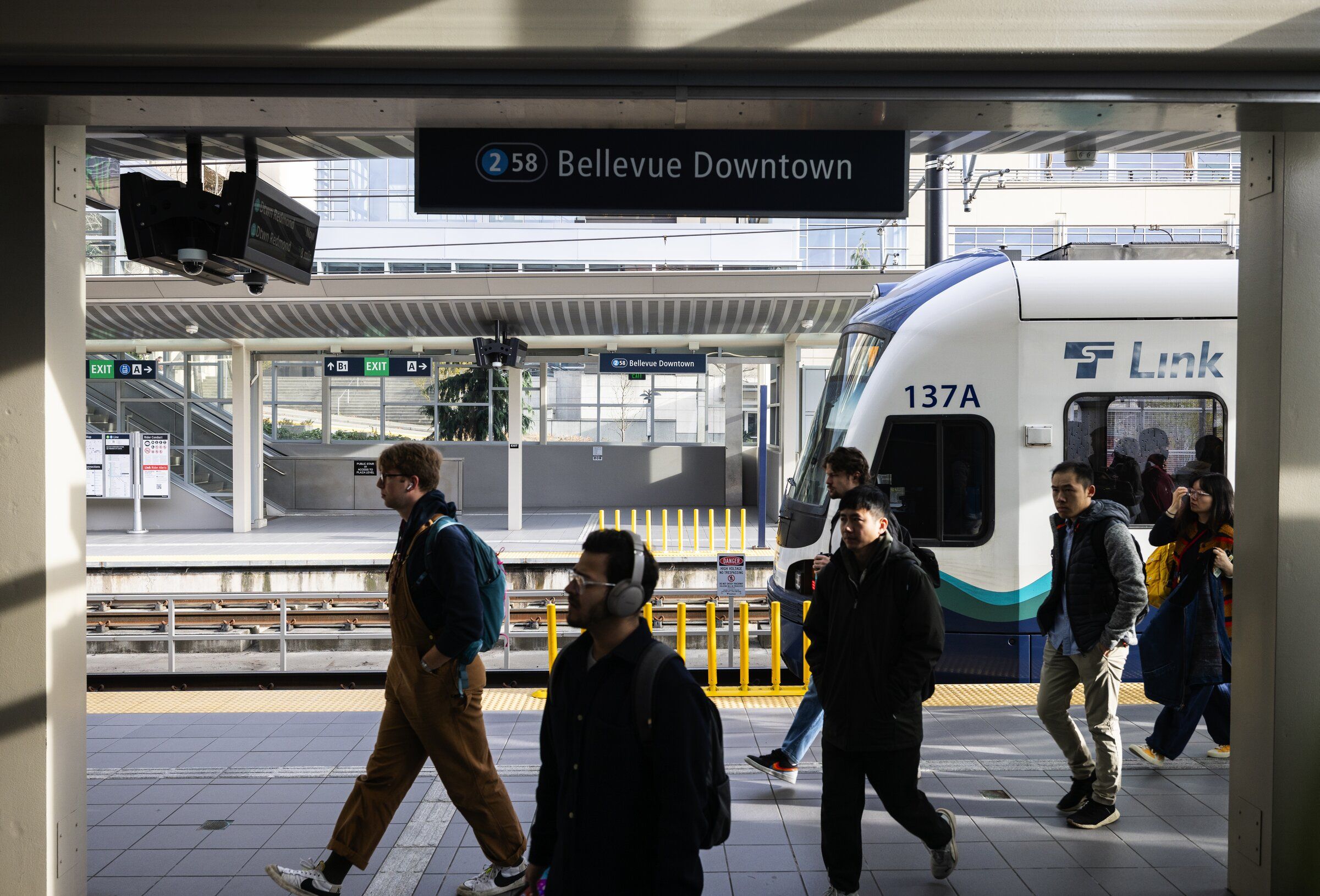 A free shuttle service started this week at Bellevue Downtown Station, taking passengers anyplace they want to go, within a large central-city service territory.  (Ken Lambert / The Seattle Times)