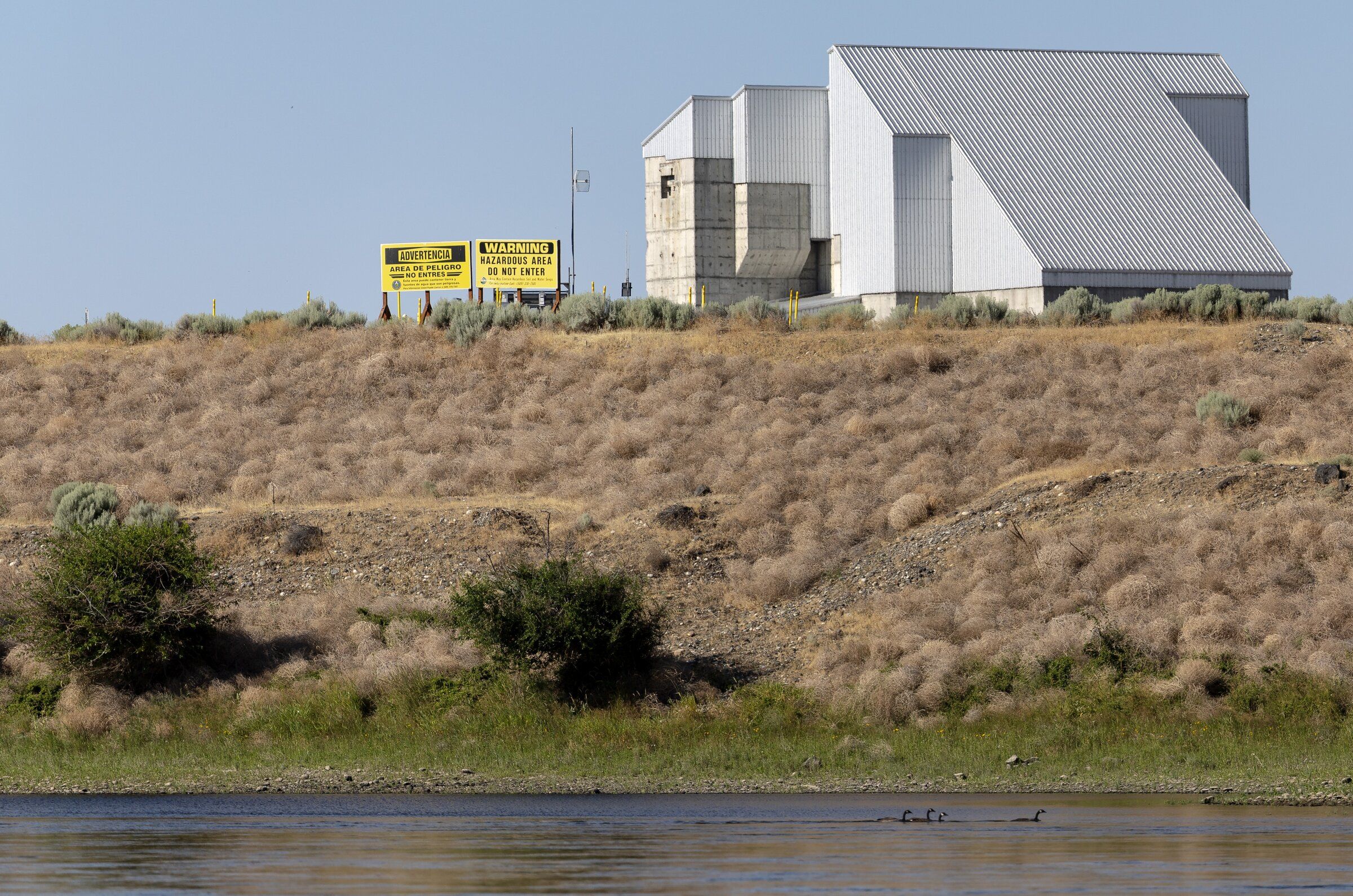 Warning signs mark a hazardous area of the Hanford nuclear site production facility near Mattawa, Grant County. (Nick Wagner / The Seattle Times, 2025)