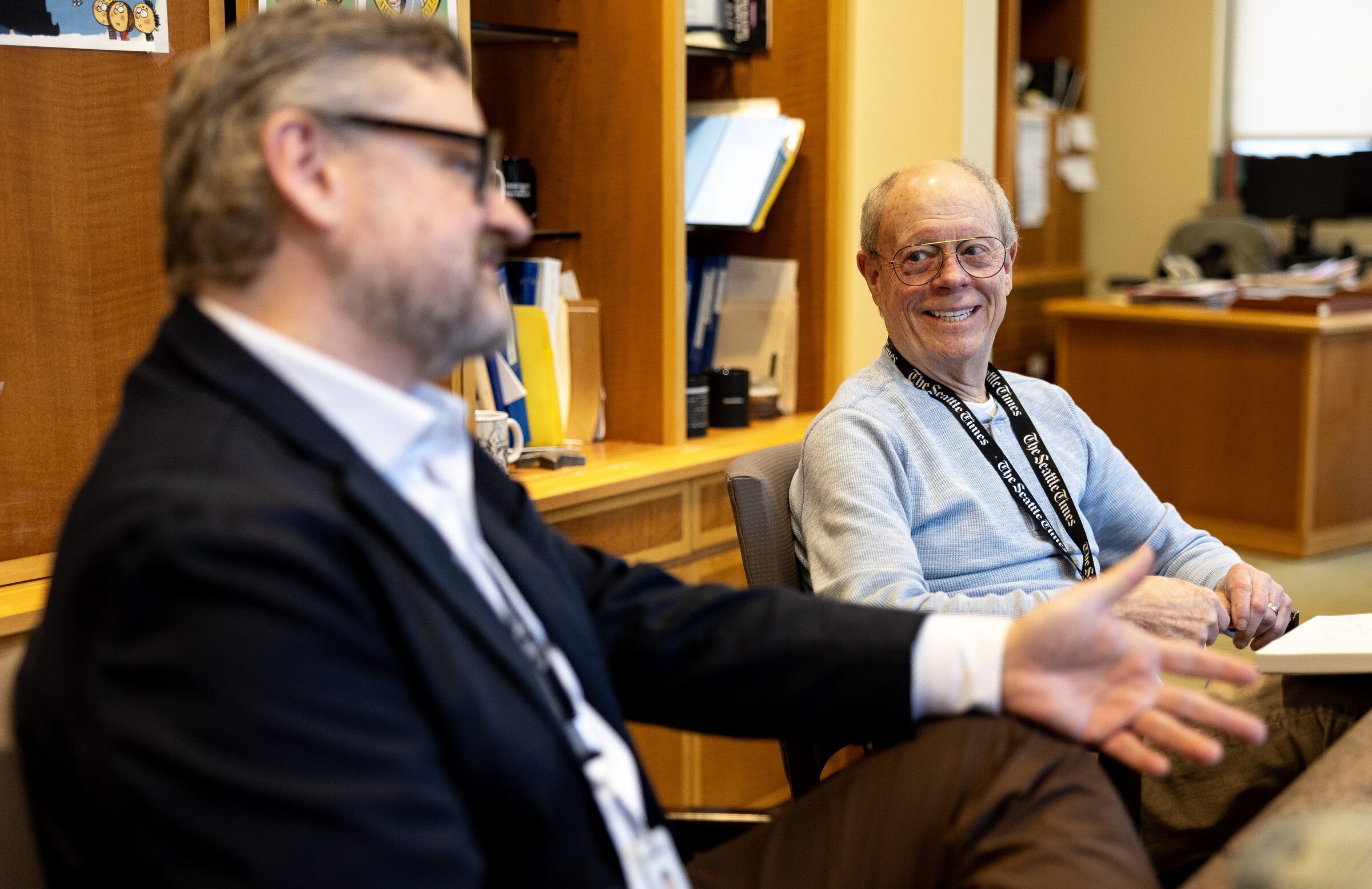 Ryan Blethen, publisher of The Seattle Times, left, sits beside his father and former publisher Frank during an interview in January in Seattle. (Nick Wagner / The Seattle Times)