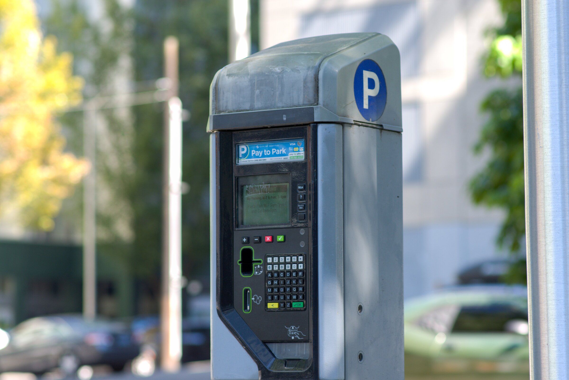 Only 1 to 2% of drivers use coins to pay for on-street parking, according to Seattle Department of Transportation officials. (Ann Duan / The Seattle Times)