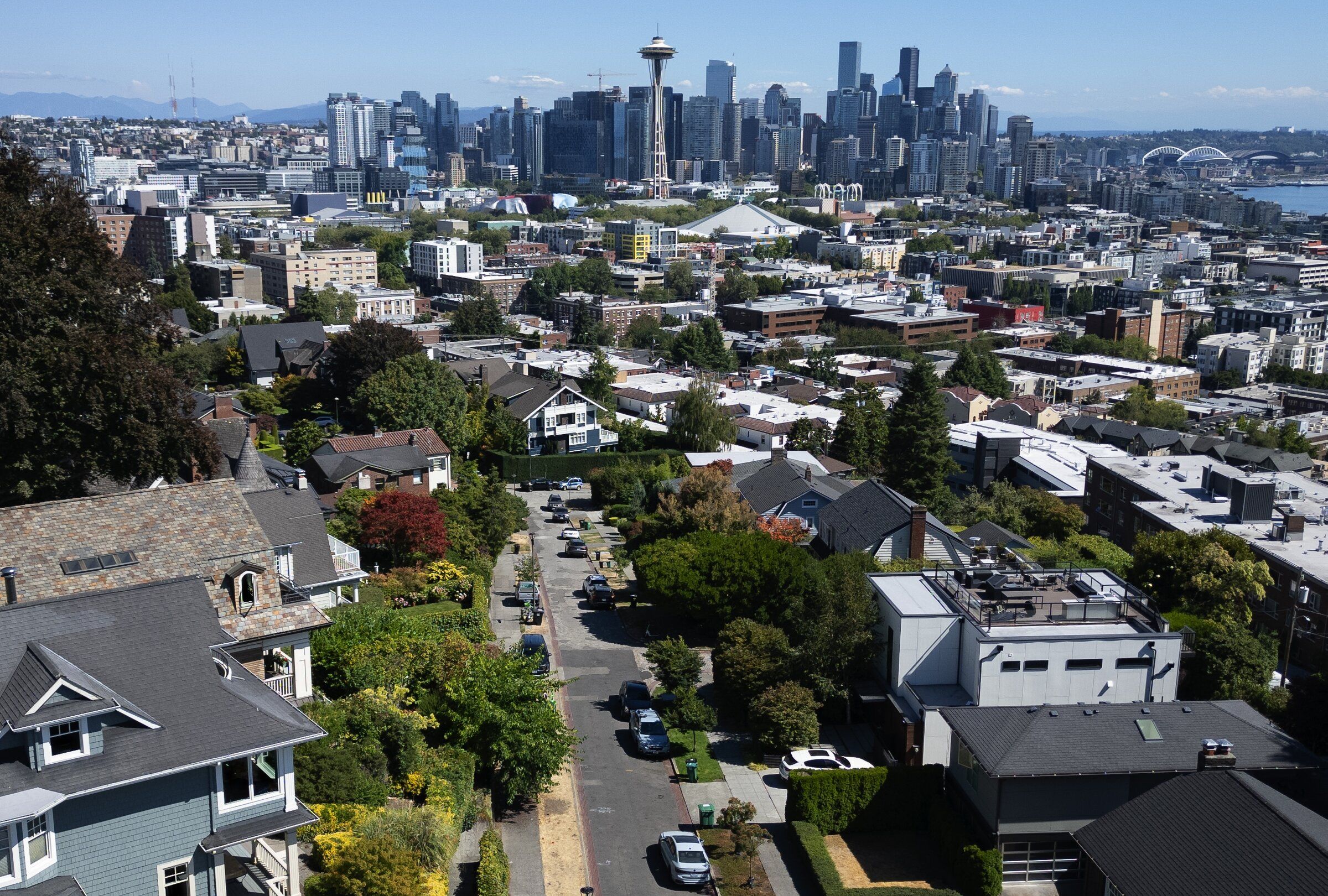 Homes along the south slope of Queen Anne Hill enjoy views of downtown and Elliott Bay without the visual clutter of power lines and poles. But the neighborhood has had to deal with power outages as the underground cables deteriorate. (Ken Lambert / The Seattle Times)