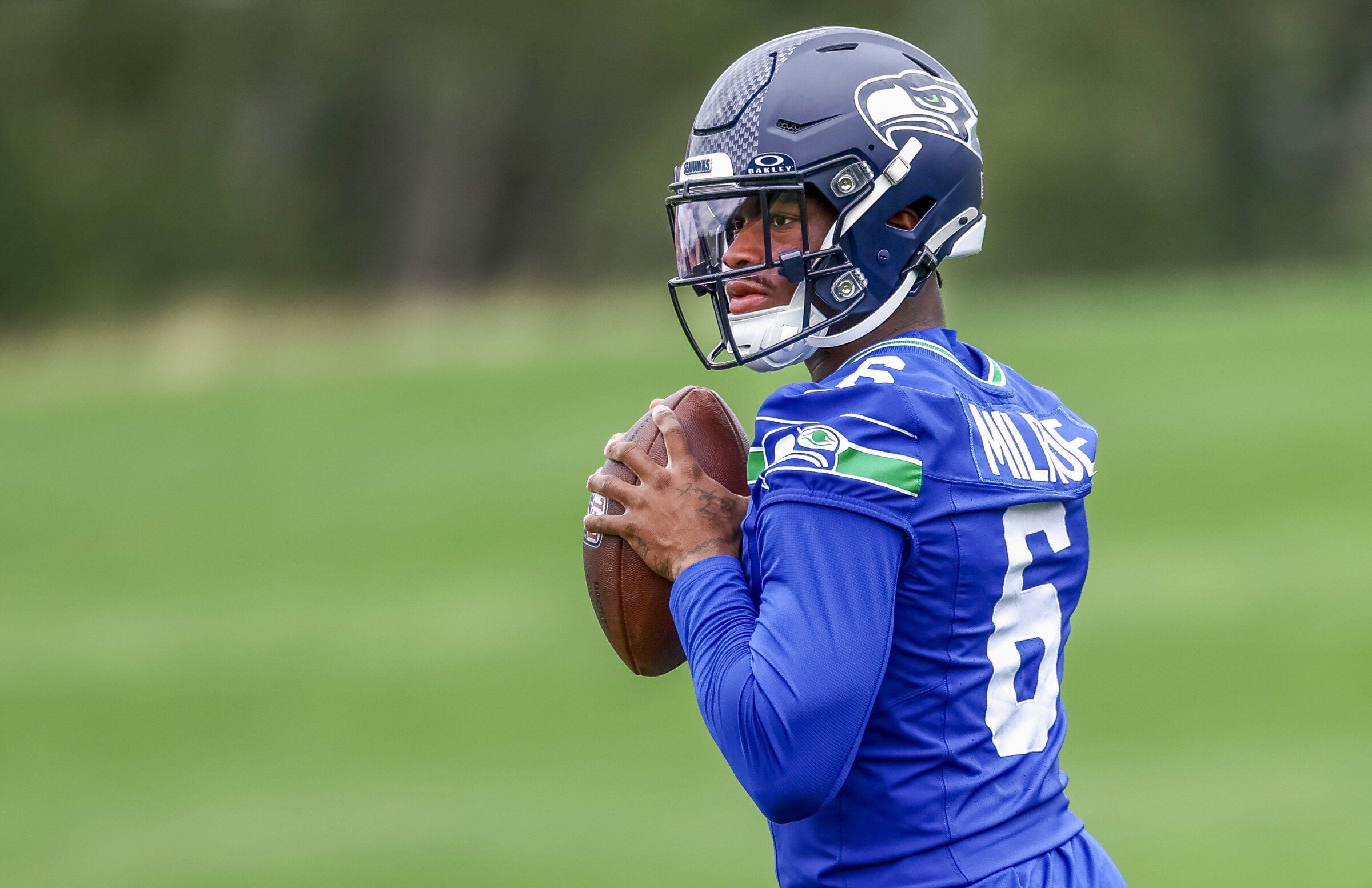 Seahawks quarterback Jalen Milroe drops back to pass during OTAs at the Virginia Mason Athletic Center on Thursday, June 4, 2026, in Renton. (Nick Wagner / The Seattle Times)