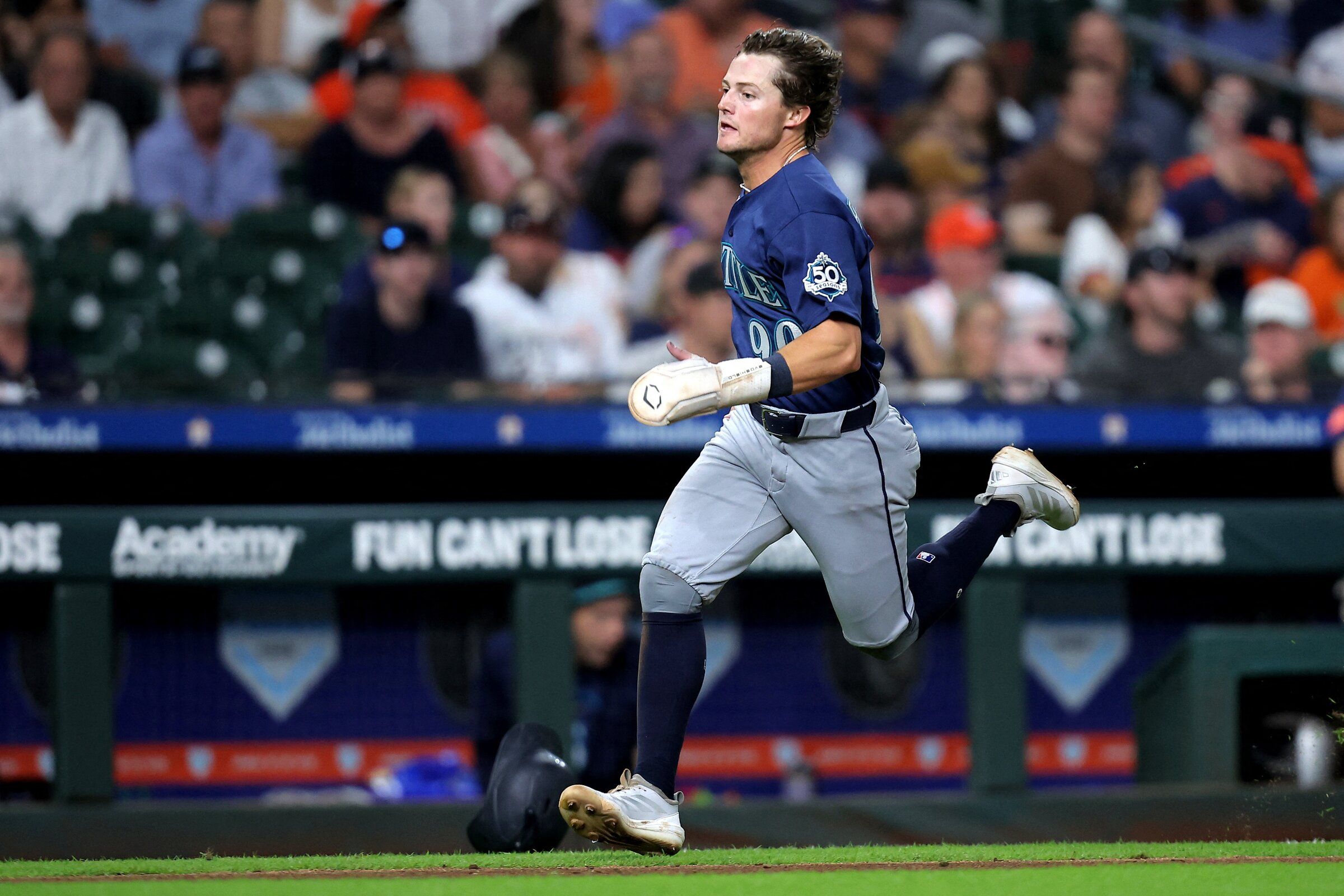 Aug 15, 2026; Houston, Texas, USA; Seattle Mariners shortstop Brock Rodden (90) runs towards home plate to score a run against the Houston Astros during the eighth inning at Daikin Park. (Erik Williams / IMAGN IMAGES via Reuters Connect)