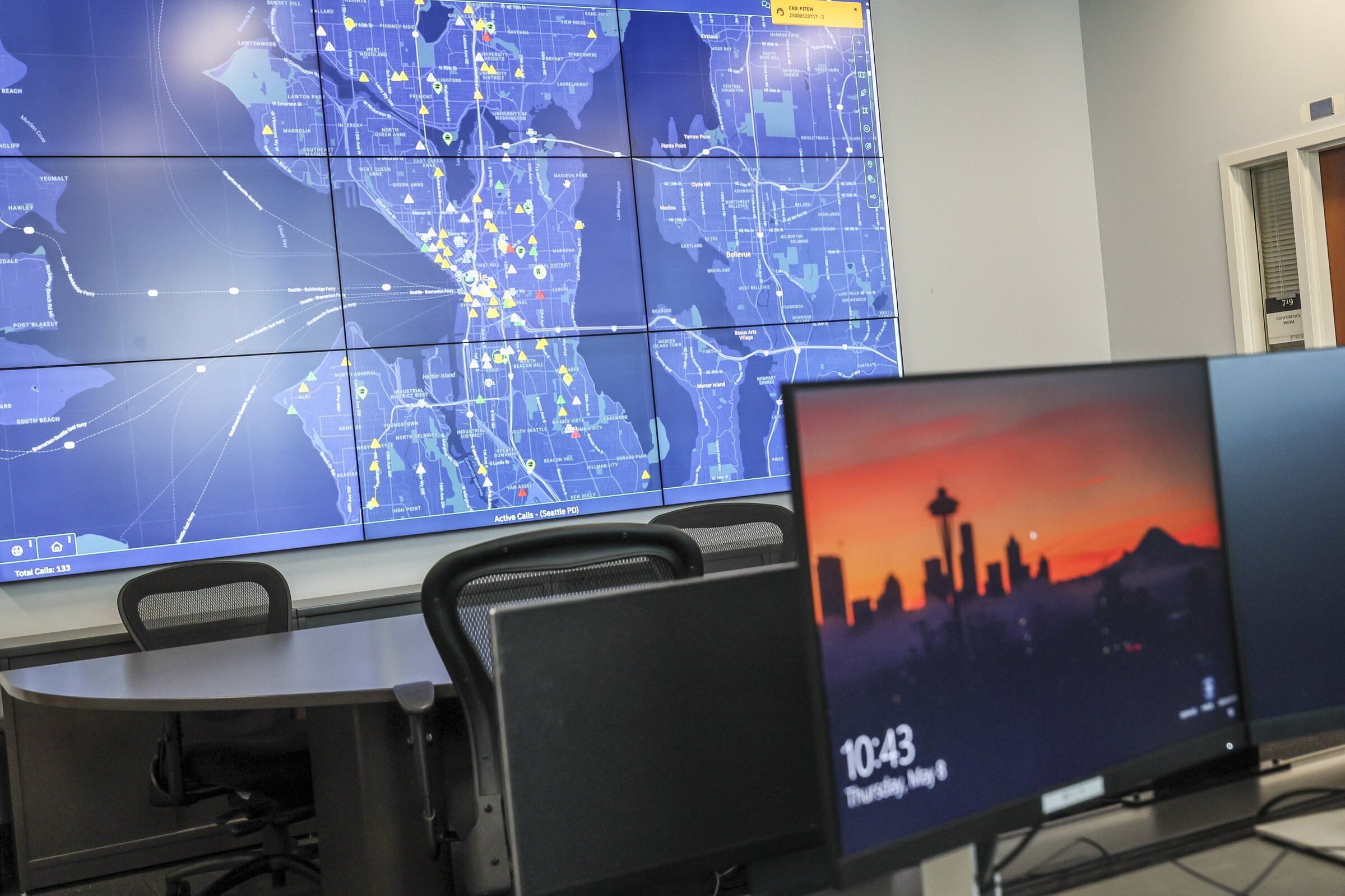 The main monitor in the Real-Time Crime Center at Seattle police headquarters, May 8, 2025. (Kevin Clark / The Seattle Times)
