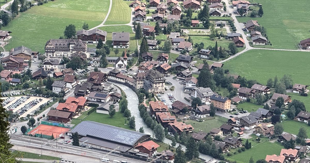 A looming rock collapse threatens a Swiss village as thawing permafrost destabilizes the Alps