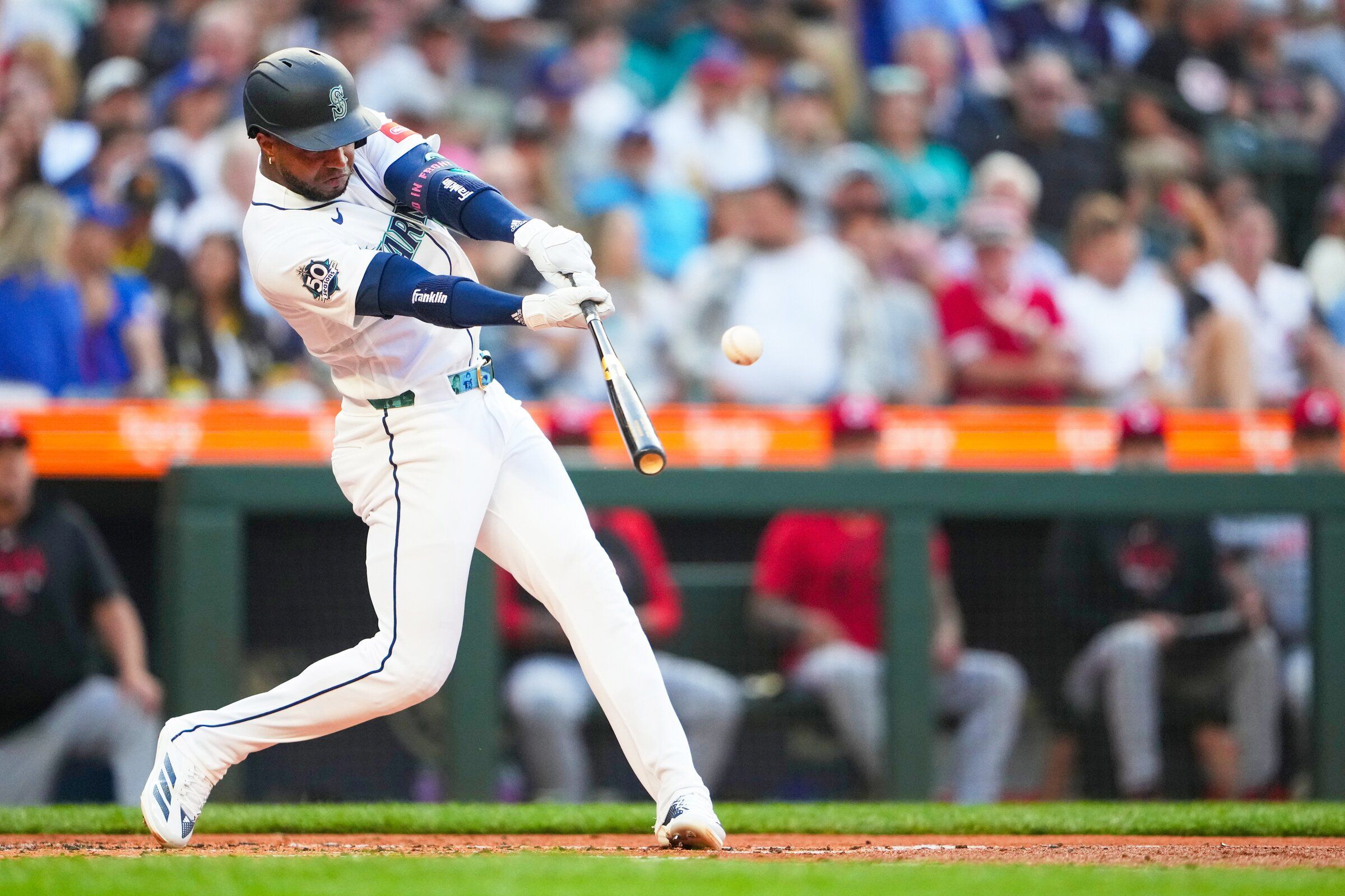 Seattle Mariners’ Victor Robles hits a single against the Cincinnati Reds, July 20, 2026, in Seattle. (Lindsey Wasson / The Associated Press)