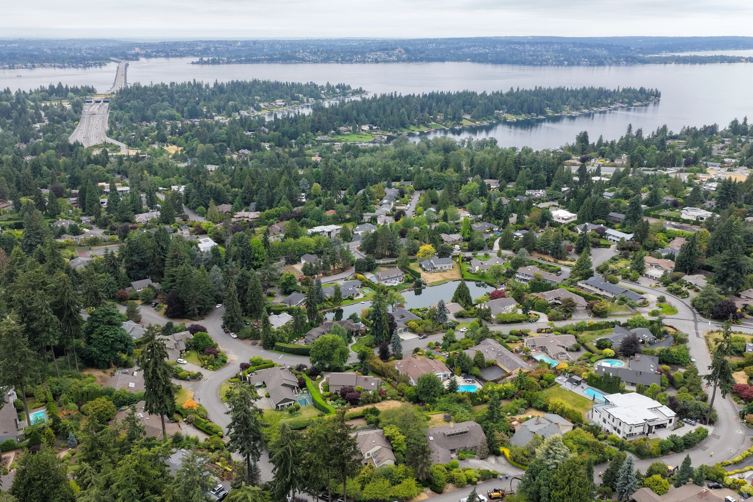 Clyde Hill is seen from the air with Interstate 520 and Lake Washington in the background on July 8. Clyde Hill is one of the richer towns in the state — with an average home value of $4.3 million — but it’s going bankrupt and may have to dissolve after almost 75 years. (Karen Ducey / The Seattle Times)