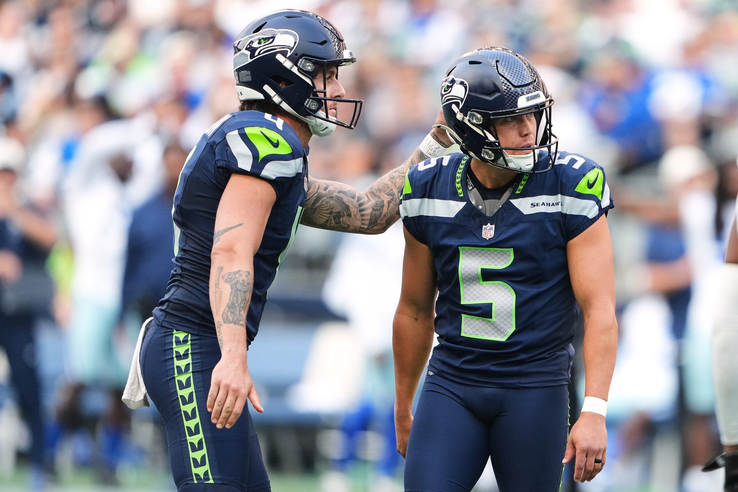 Michael Dickson (4) and Jason Myers (5) watch Myers miss a field-goal attempt — one of the few kicks the Seattle Seahawks kicker missed last year. (AP Photo / Lindsey Wasson)