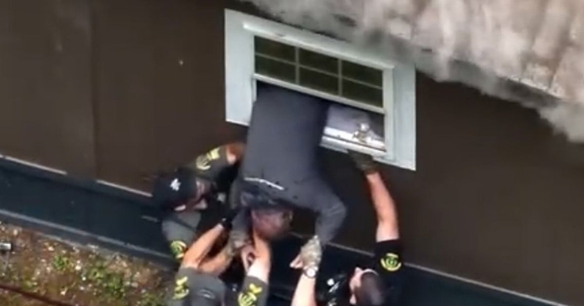 Dramatic footage shows WA man rescued from burning home