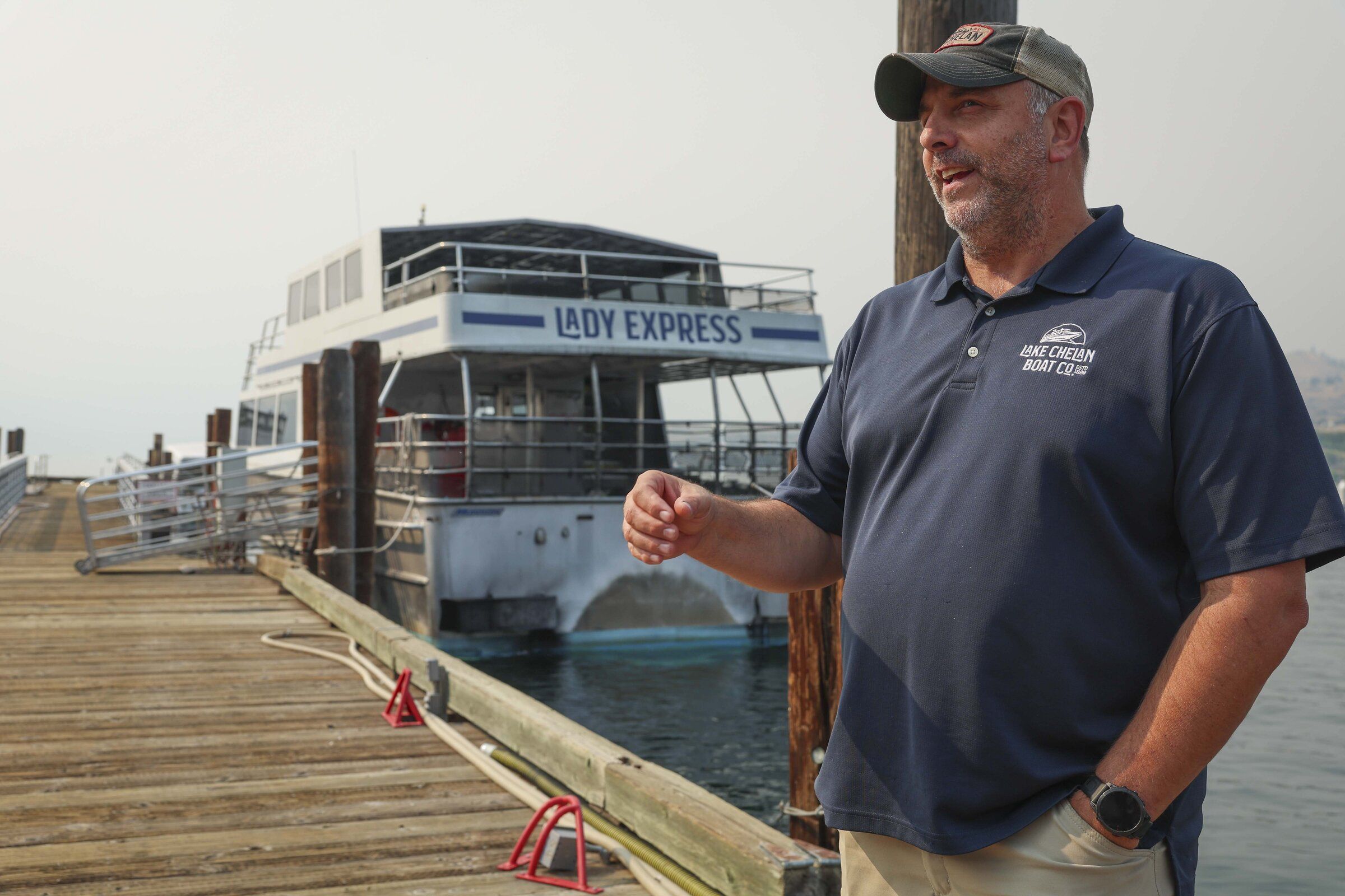 Co-owner Brun Garfoot speaks with a Seattle Times reporter at Lake Chelan Boat Company in Chelan on Thursday, Aug. 20. (Ivy Sebayo / The Seattle Times)