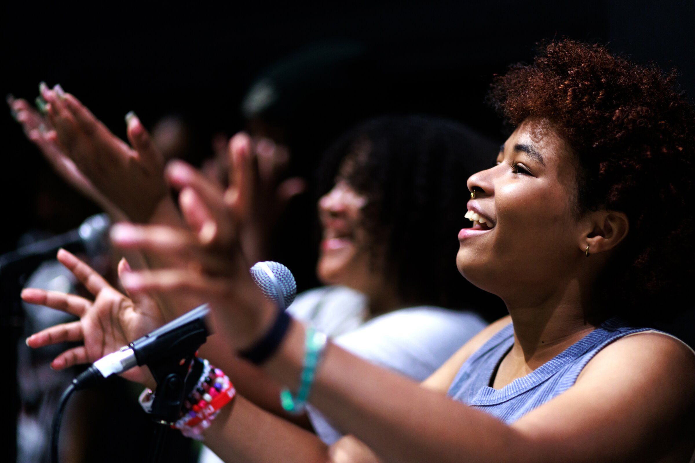 Thirteen-year-old Naomi Williams, right, and 18-year-old Ollie Youngblood, in back, sing during a dress rehearsal for Seattle’s youth summer musical “Peter Pan: Ready to Fly” at McCaw Hall in Seattle on Tuesday. (Erika Schultz / The Seattle Times)