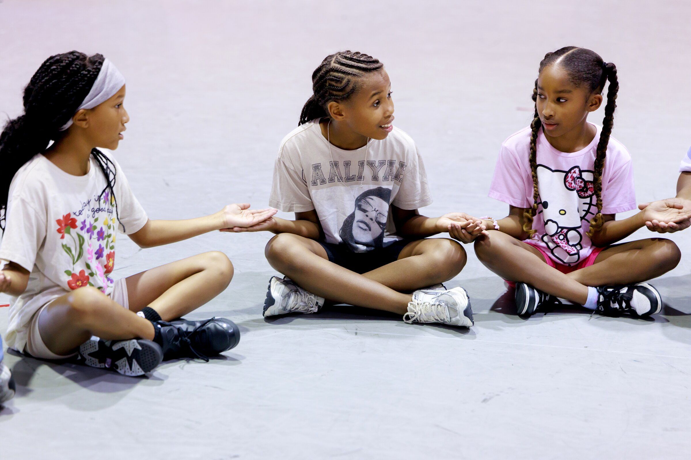 Malia Terry, left, Taleiya Ward and Jaiel Wheeler take part in a dress rehearsal for the youth summer musical “Peter Pan: Ready to Fly” at McCaw Hall in Seattle on Tuesday. (Erika Schultz / The Seattle Times)
