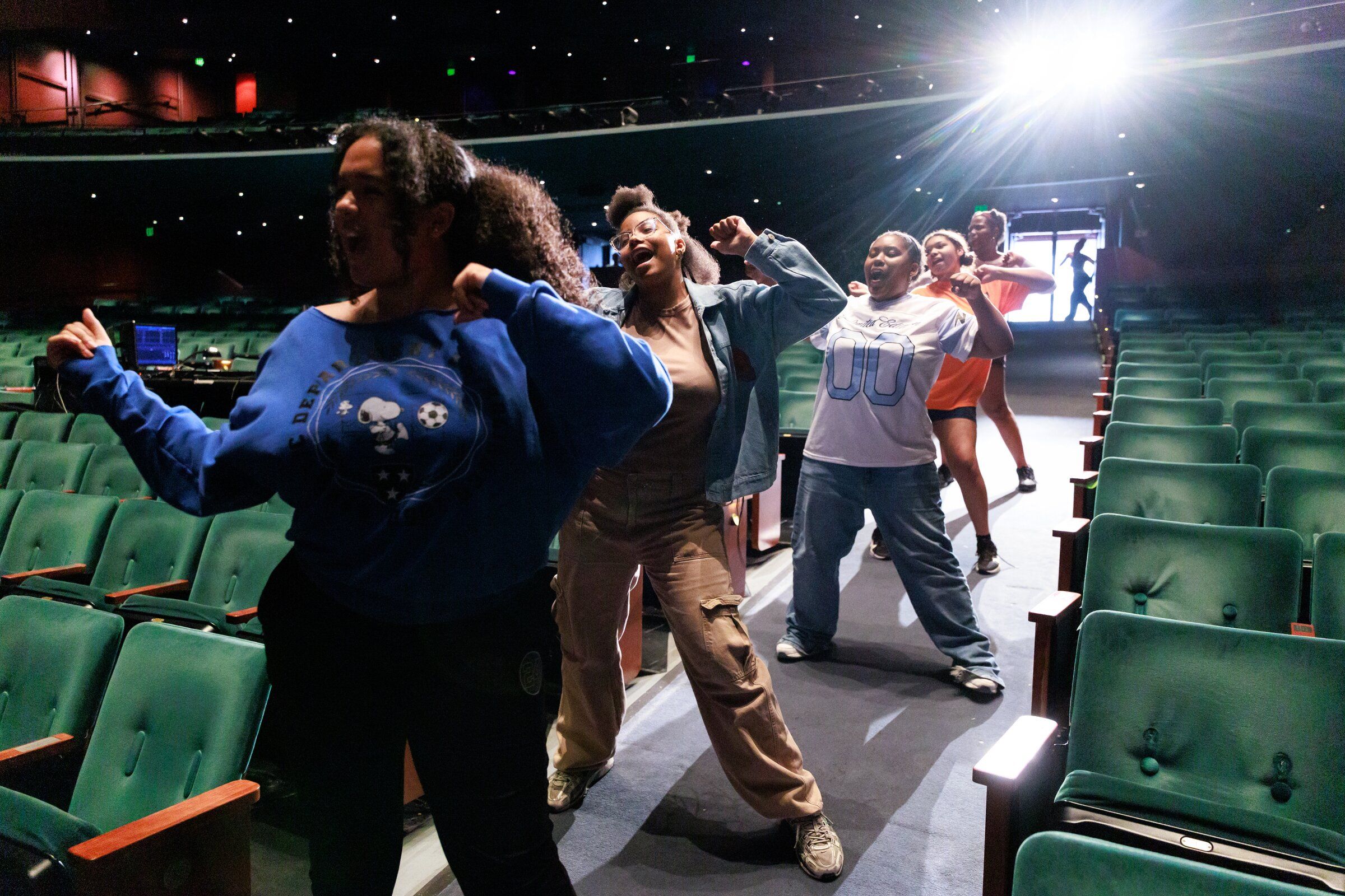 Sariah Ling, 18, from left, Kennedy Mungro, 16, I’necia Curry, 17, Khalisie Albright, 13, and Amori Singleton, 18, practice during dress rehearsal for Seattle’s Teen Summer Musical, “Peter Pan: Ready to Rise” at McCaw Hall in Seattle on Tuesday. The production, which features more than 80 students aged 9-18, will run from August 28-30  and is a Seattle Parks and Recreations program in partnership with Acts On Stage Theater. It is the first year Seattle’s Teen Summer Musical will be held at McCaw Hall. (Erika Schultz / The Seattle Times)