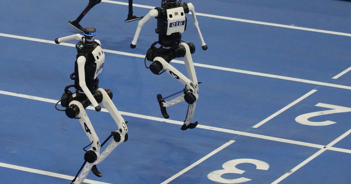 A robot sprinter shatters a 100-meter record again as sparks fly at China’s robot competition