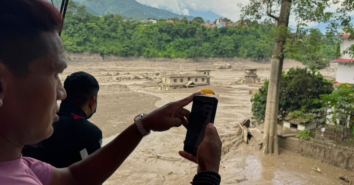 At least 22 killed and hundreds missing after avalanche triggers deadly flash floods in Nepal
