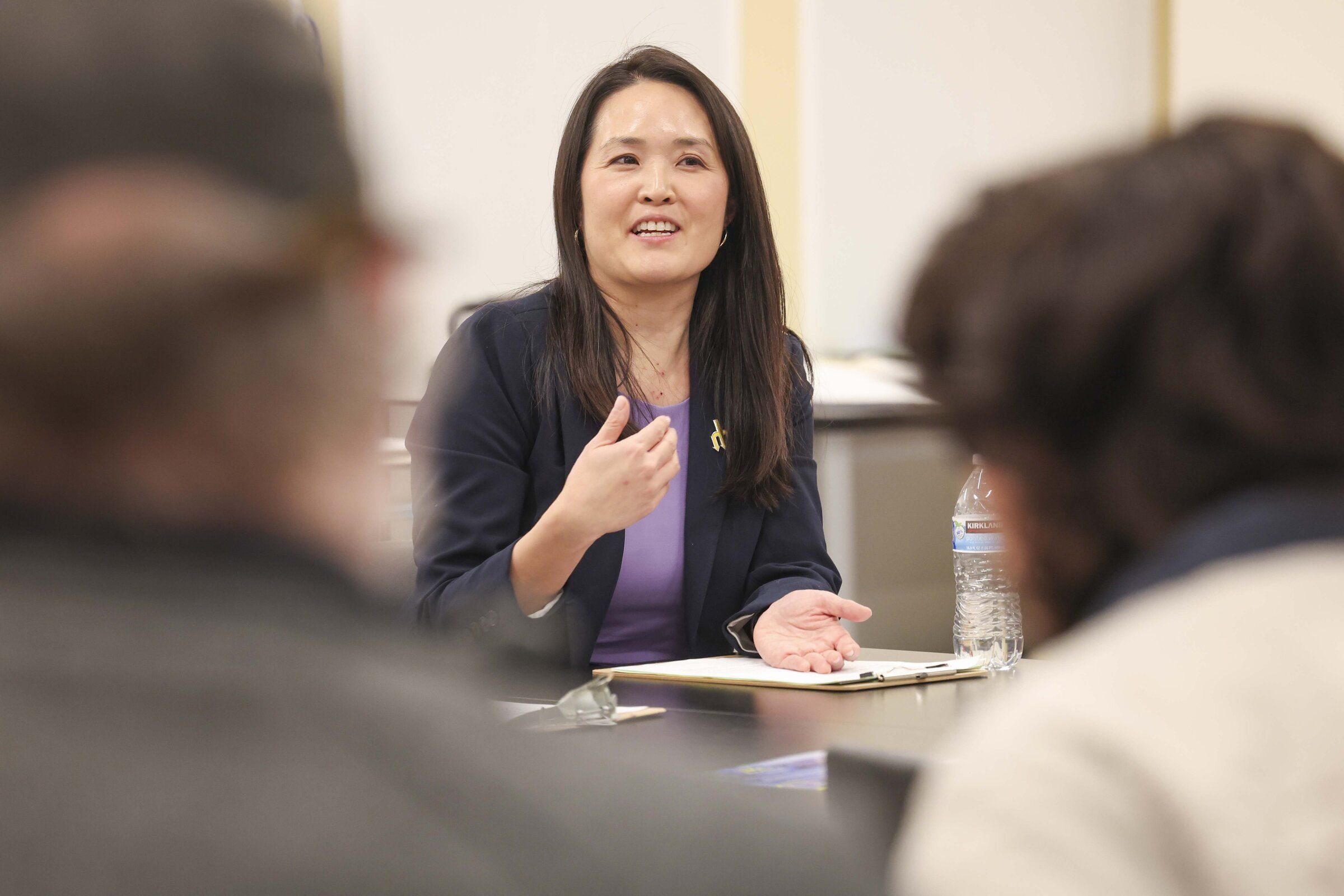 Then-candidate for Seattle School Board Director District 5 Vivian Song, speaks with members of the community during Seattle Education Coalition’s candidate forum at Rainier Beach High School in Seattle. The Seattle School Board unanimously adopted a $1.34 billion budget for the 2026-27 school year on Wednesday evening, after many months of work to begin closing the district’s $87 million deficit.  (Ivy Ceballo / The Seattle Times, 2025)
