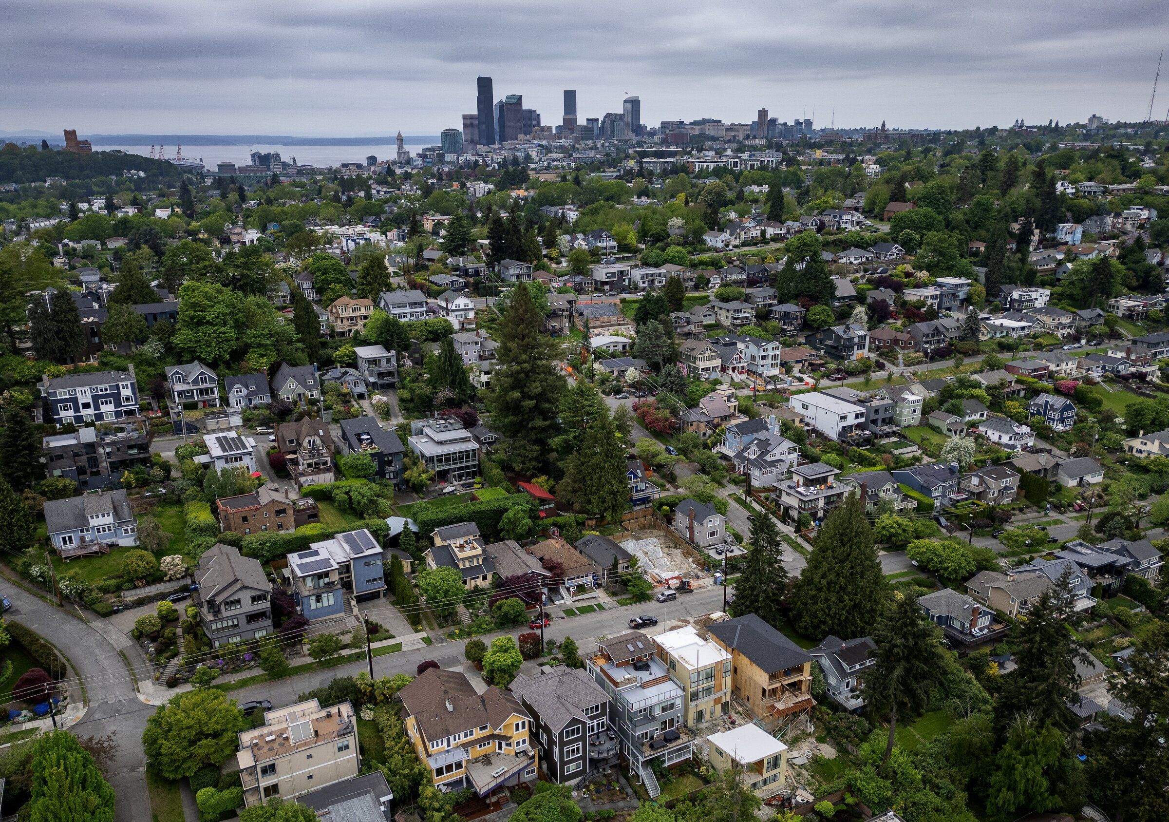 Single family homes are seen in Mt. Baker Ridge, with downtown Seattle in the background, Tuesday, May 5, 2026. (Ken Lambert / The Seattle Times)
