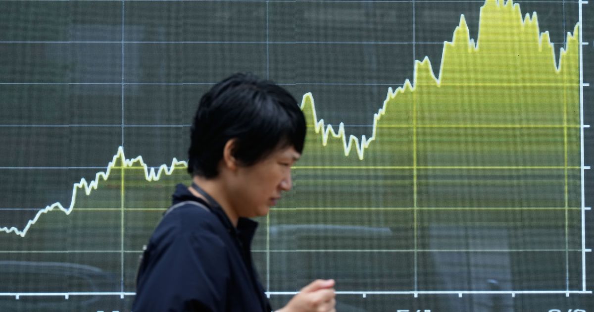 Asian shares are mostly higher while US futures and oil prices hold steady