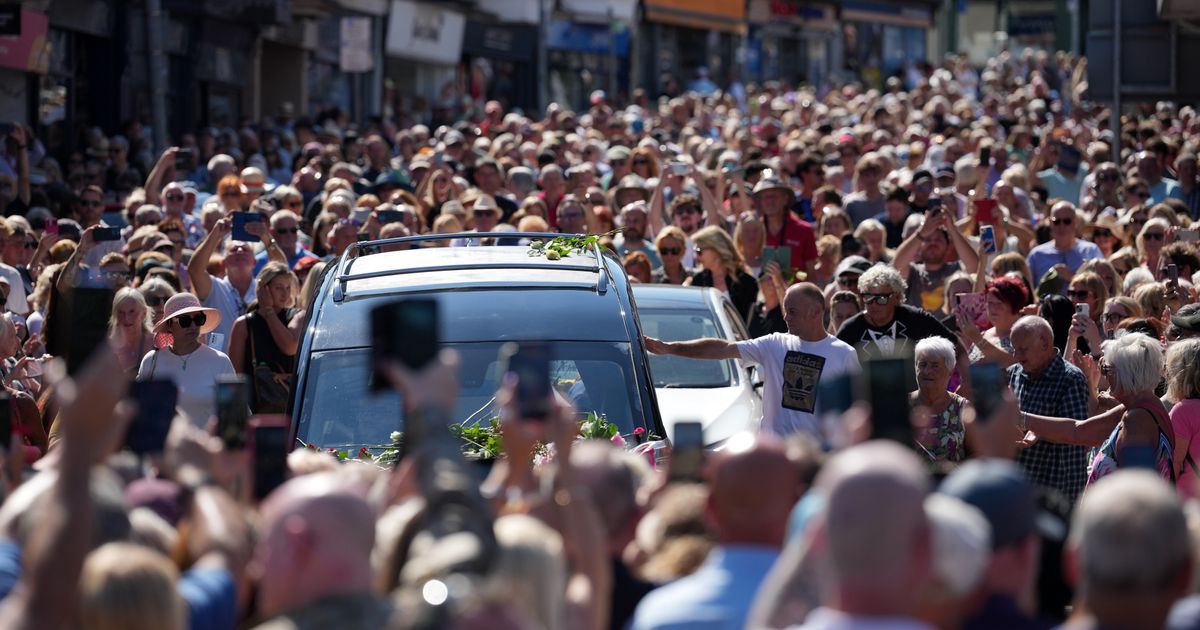 Bonnie Tyler fans line the streets of a Welsh village as her coffin is brought home