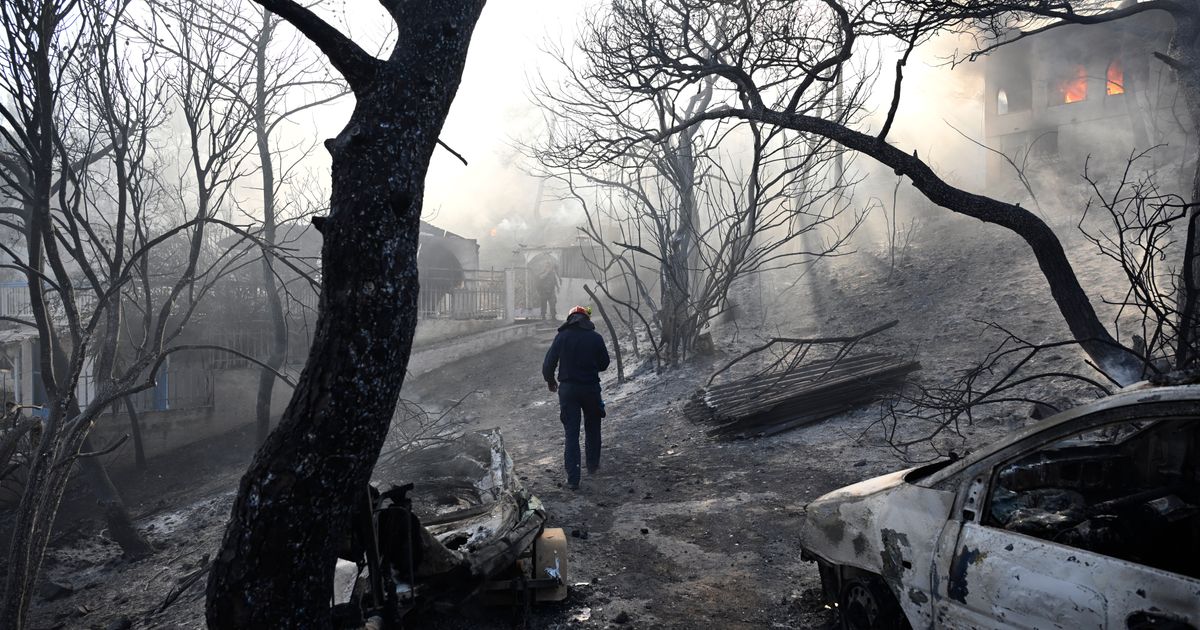 Belgian wildfire approaches Germany despite rain as Greece probes deadly blaze