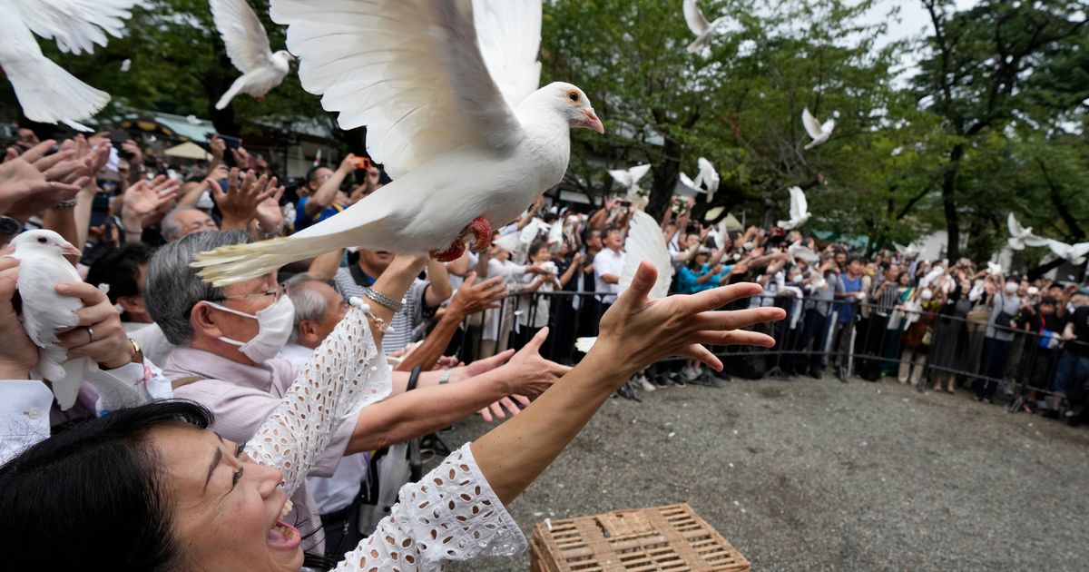 Japan’s Defense Minister Koizumi prays at shrine seen by neighbors as symbol of Japanese militarism