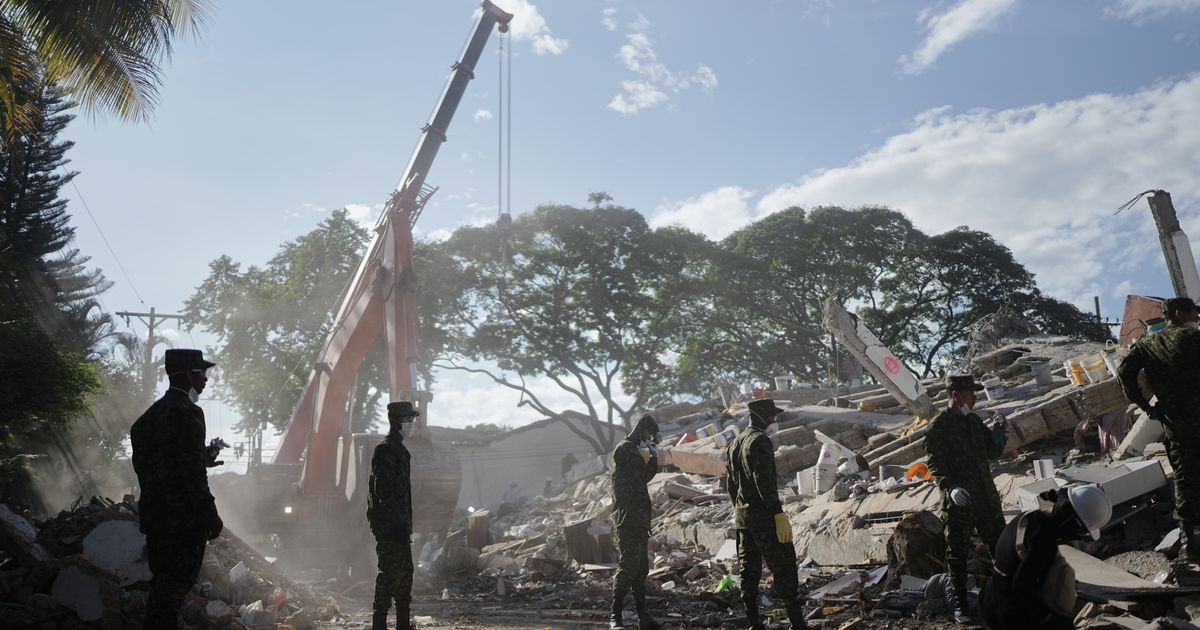 Rescuers call for silence around earthquake rubble as window for survival narrows in Colombia