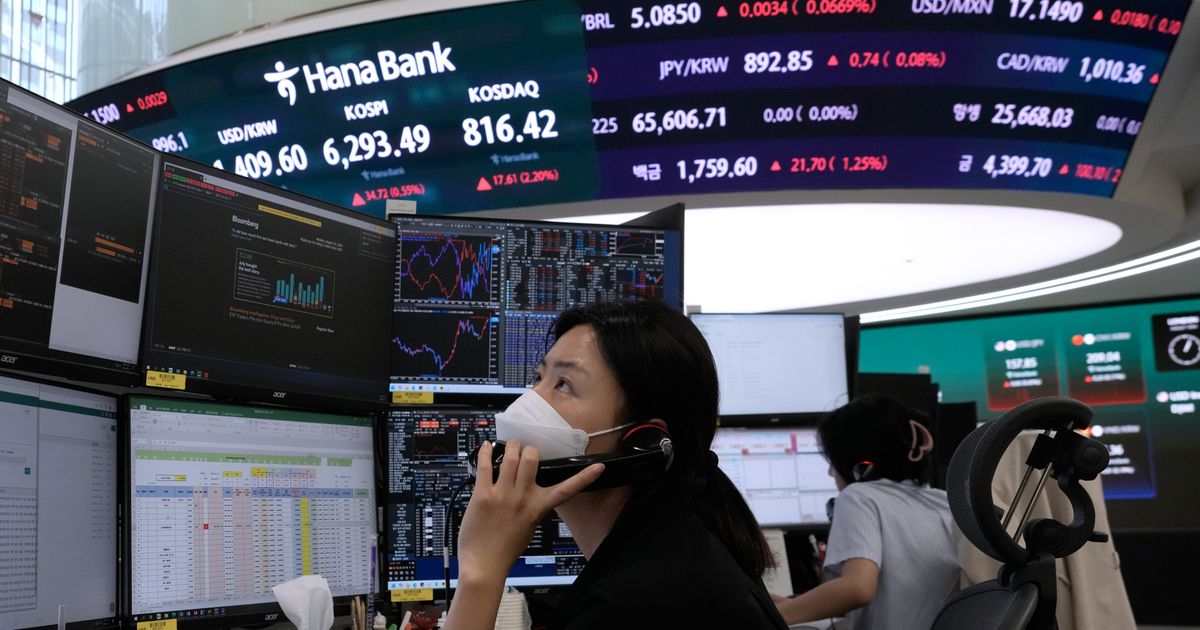 Asian shares are mixed after gains on Wall Street, while oil prices climb