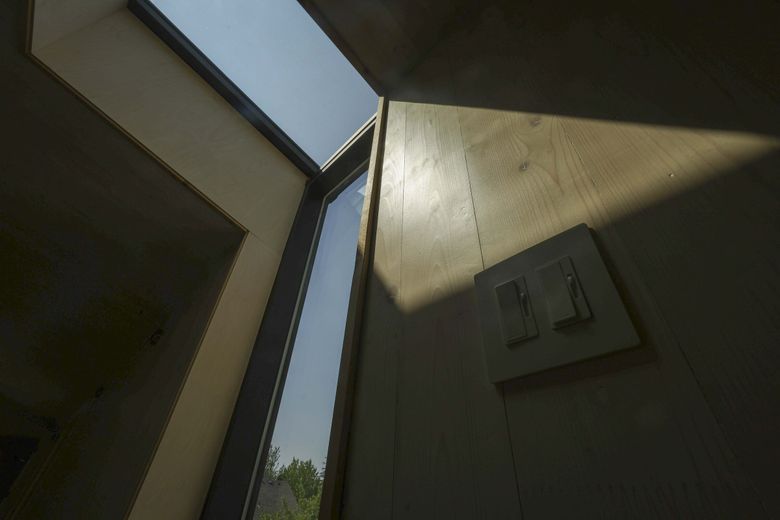 Cross-laminated timber at the Kenmore home designed by atelierjones. (Ivy Ceballo / The Seattle Times)