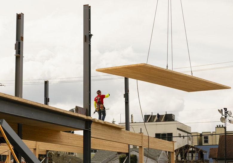 The new Alki Elementary School in Seattle, designed by Mahlum Architects, was built with large cross-laminated timber panels. Compared to traditional construction systems, mass timber products retain carbon in the structure. (Courtesy of Mahlum Architects)