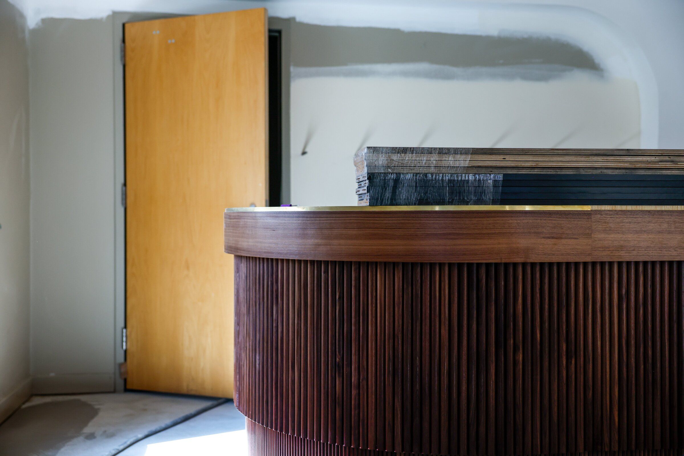 A photo taken Aug. 18 shows the West Bar under construction on the Safeco Founders level in Benaroya Hall’s Grand Lobby. (Andrew Burk-Stevenson / The Seattle Times)