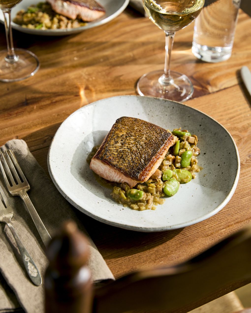 The cuisine of the Piedmont region doesn’t usually focus on seafood, but Lane includes some fish on the Spinasse menu (and in the cookbook) to take advantage of locally available foods, like king salmon.  (Charity Burggraaf / For Spinasse)