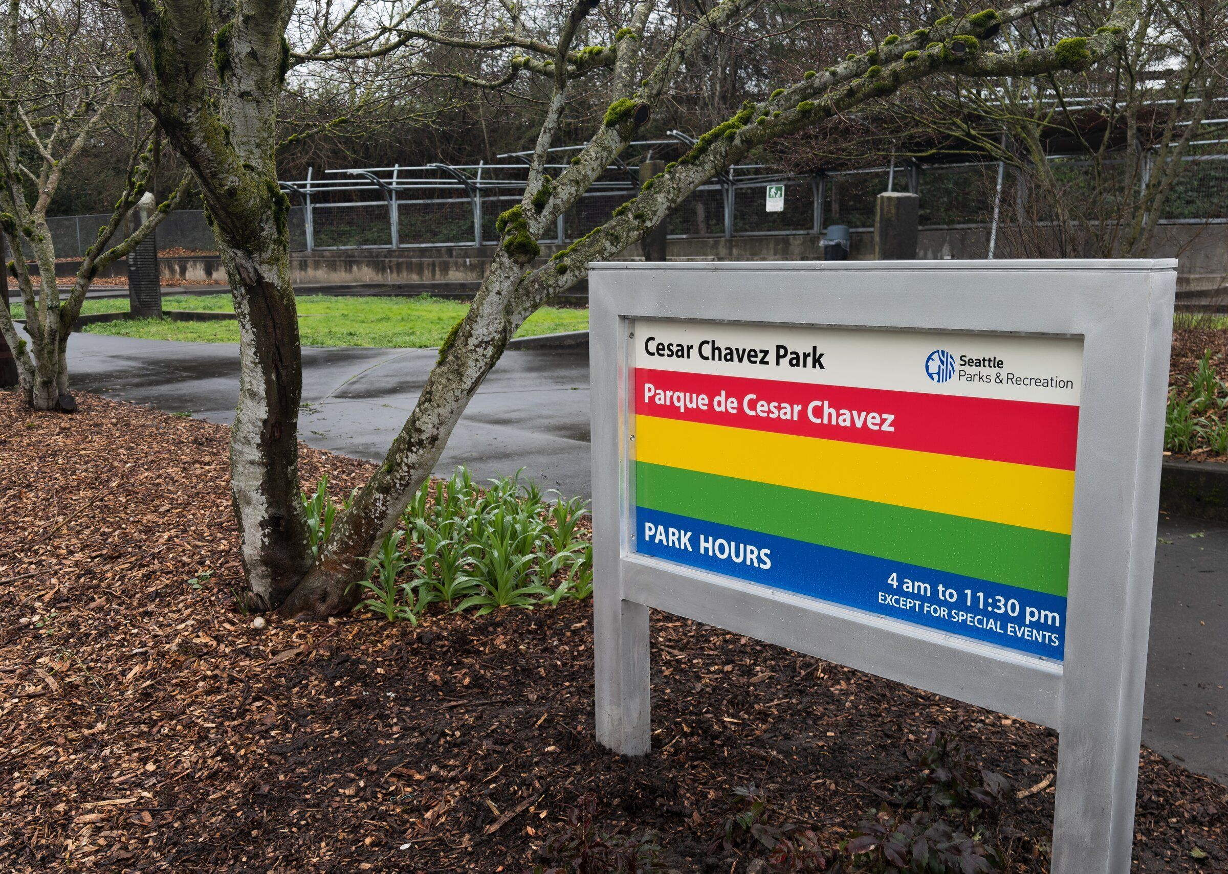 A sign for César Chávez Park, located at 700 S. Cloverdale St., is seen in March in Seattle’s South Park neighborhood. After explosive allegations of sexual abuse surfaced against the late farm-labor activist who the park was named after, the city has announced a new name for the space: Parque Libertad. (Erika Schultz / The Seattle Times)