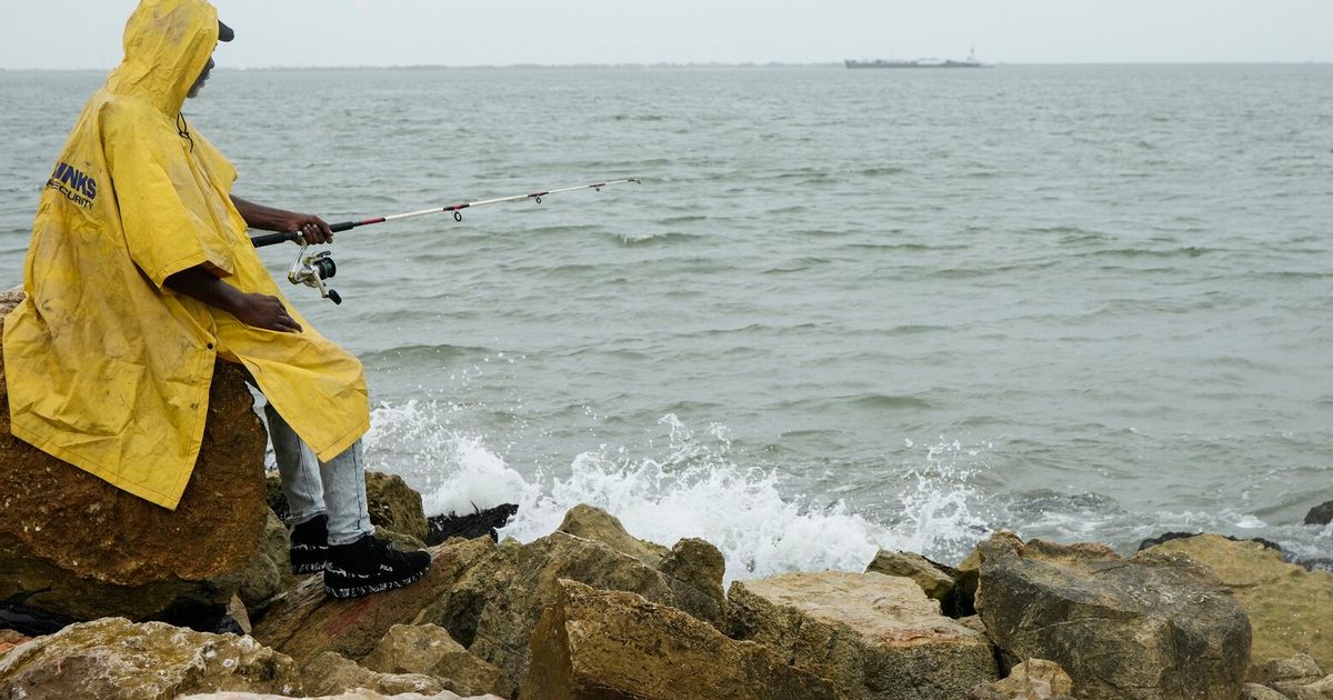 Edouard, now a tropical depression, drenches Texas with flash flooding and downed trees