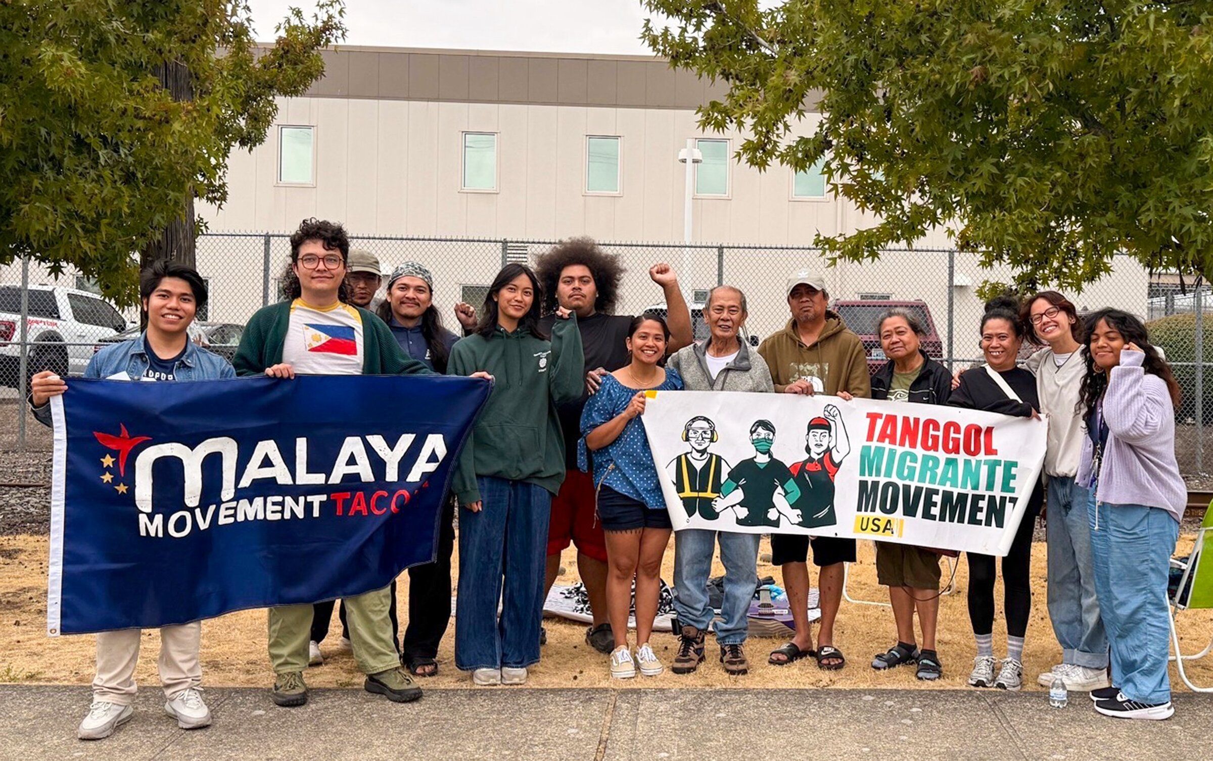 Family members and advocates surround Loreto Javar, a 76-year-old green card holder with stage 4 prostate cancer, after his release Monday from ICE’s Northwest Detention Center in Tacoma on personal recognizance. (Photo courtesy of Tanggol Migrante Movement Washington)