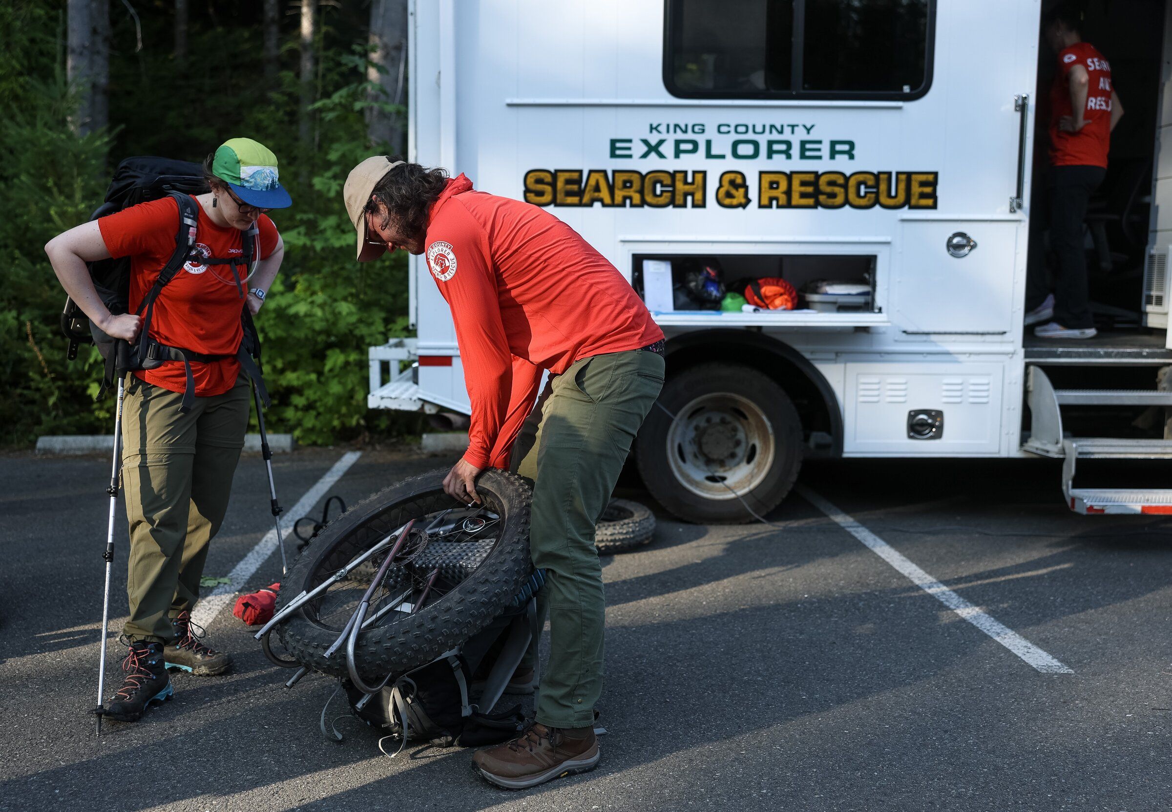 King County Explorer search-and-rescue volunteers prepare for training on July 31 near North Bend. (Nick Wagner / The Seattle Times)