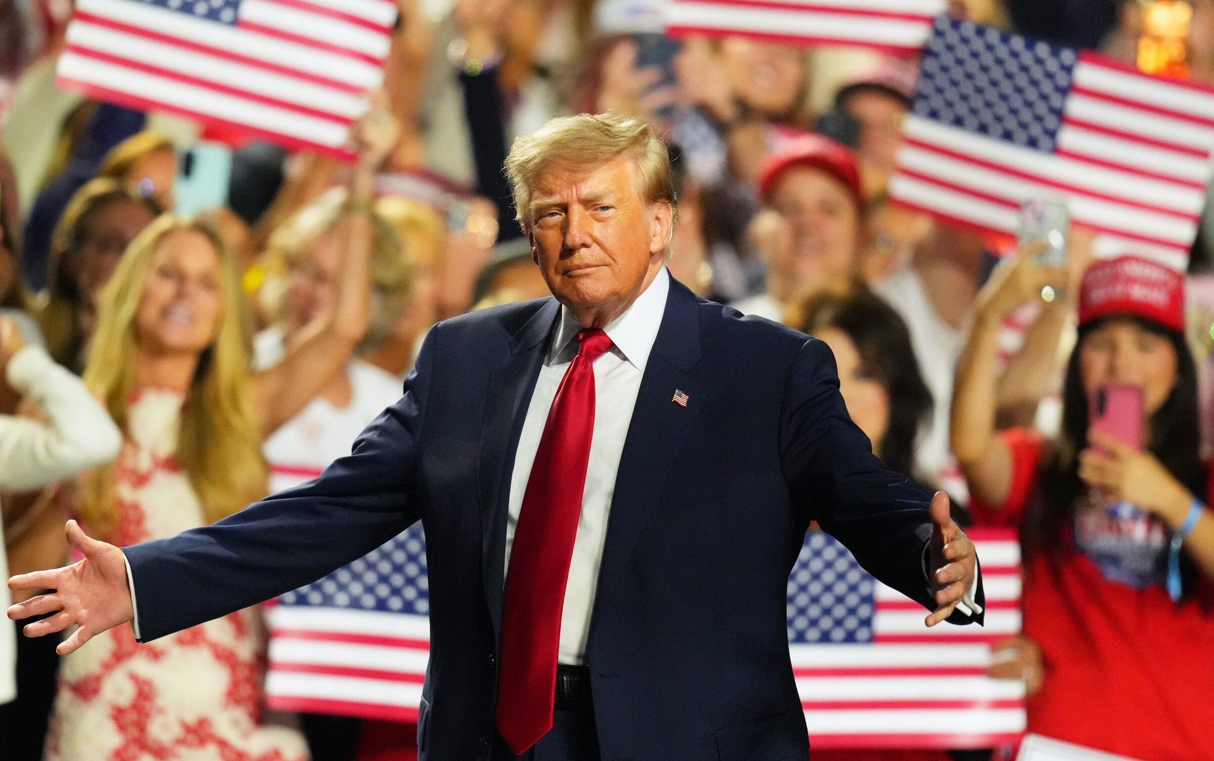 President Donald Trump greets supporters as he takes the stage at the Republican Party convention Thursday in Dallas. The new Trump-backed political action committee is reportedly entering Washington’s most competitive congressional race as Republicans try to preserve a president-aligned majority in the House. (Julio Cortez / AP Photo/Julio Cortez)