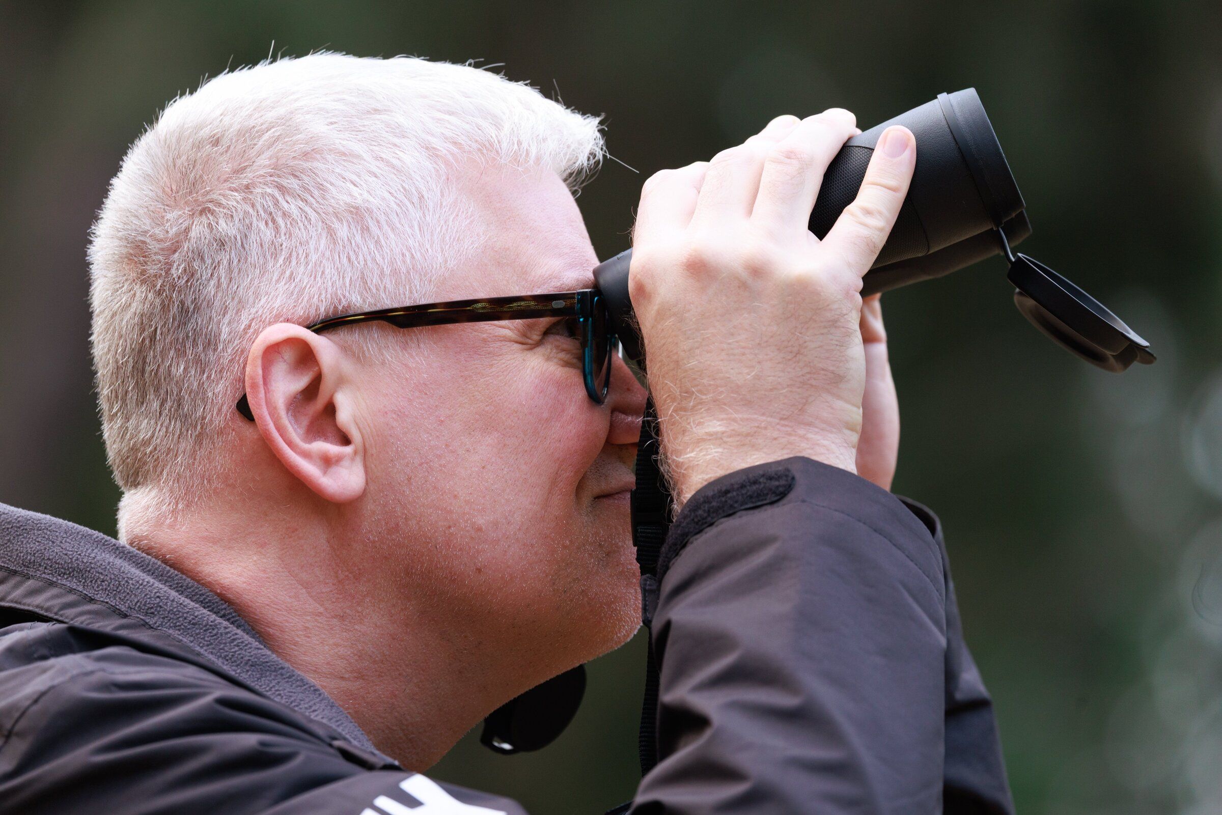 John Woodard, pictured above, and Michael Witter have been the only monthly volunteers for the Seward Park bird study for more than a decade. The other volunteers moved away many years ago. (Erika Schultz / The Seattle Times)