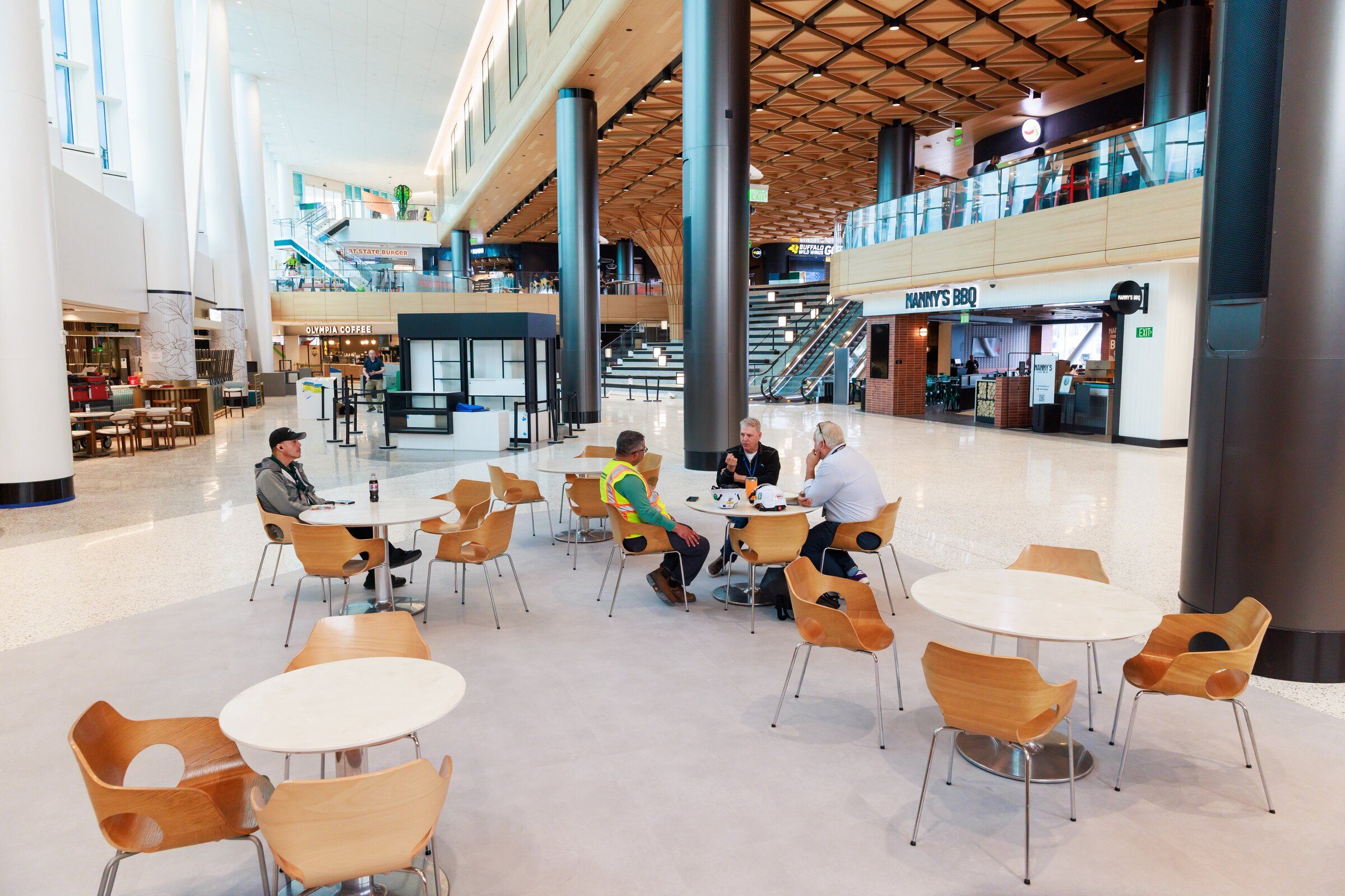 A recent redo of Seattle-Tacoma International Airport’s C Concourse increased the 81,000-square-foot building to more than 225,000 square feet, with artwork, a tiered amphitheater, dining, retail, a nursing room, a new Alaska Airlines Lounge and an interfaith prayer and meditation room.  (Erika Schultz / The Seattle Times)