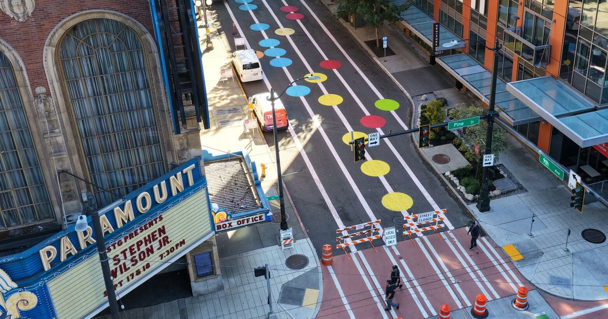 Seattle Convention Center painted the street. The paint won’t come off