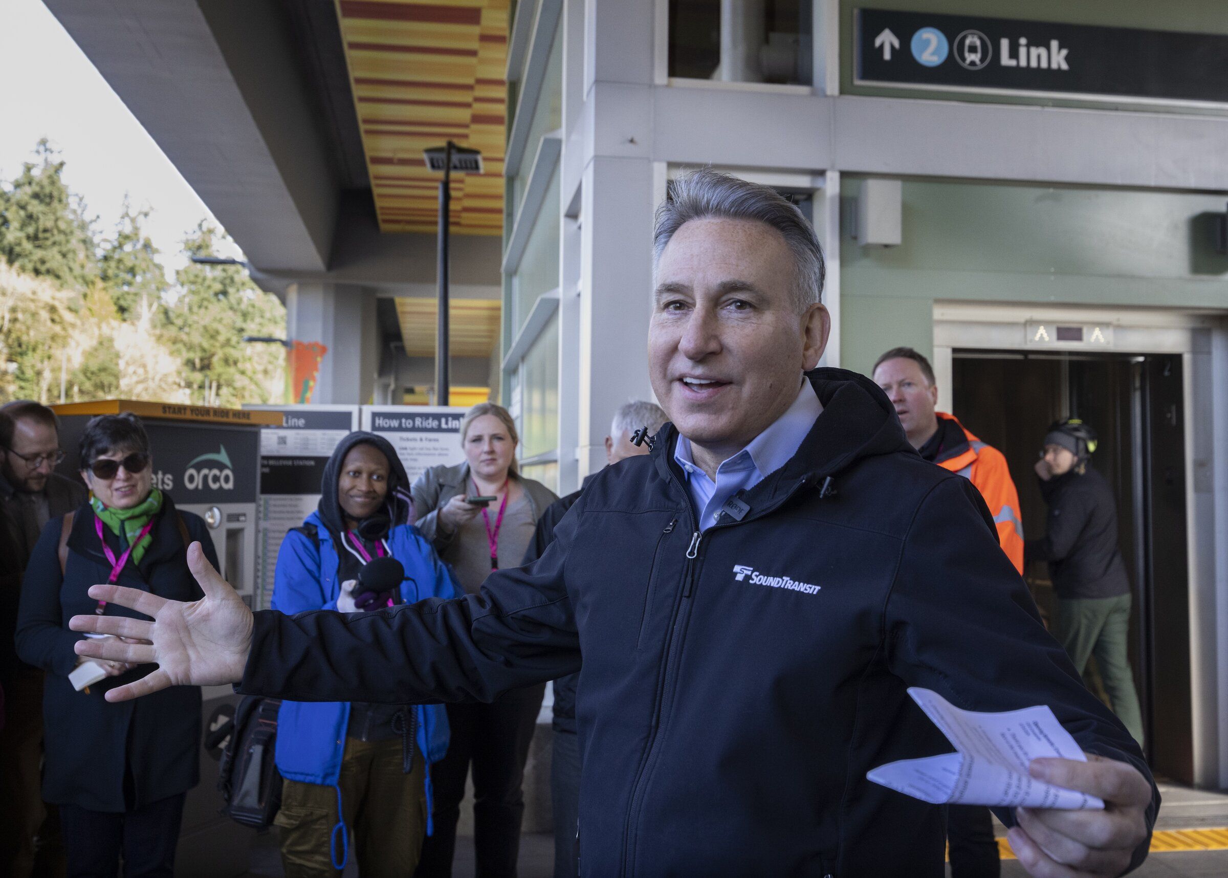 Sound Transit CEO Dow Constantine hosts a preview tour of the new light rail segment across Lake Washington, ahead of its grand opening in March. (Ellen Banner / The Seattle Times)