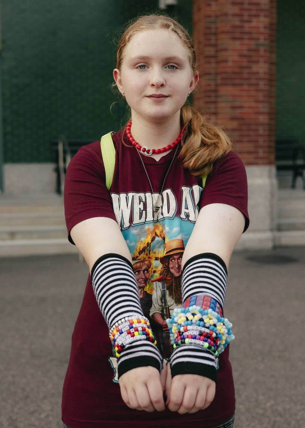 A concertgoer dons Weird Al memorabilia during his Bigger & Weirder tour at UBS Arena in Elmont, N.Y., on July 12, 2026.. Men who grew up in the ’80s and ’90s have introduced their children to Weird Al’s high jinks. (Timothy O’Connell/The New York Times) XNYT1000 (TIMOTHY O’CONNELL / NYT)